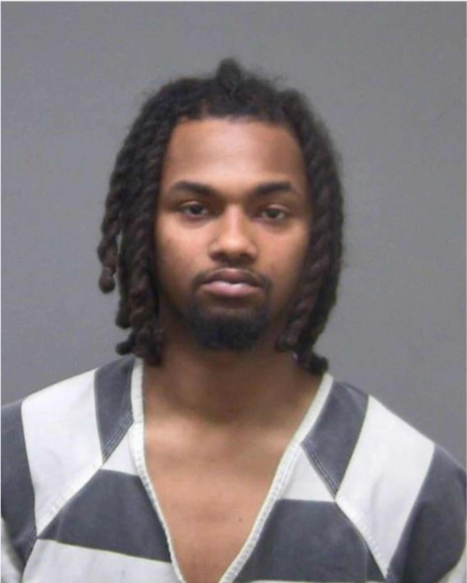 Kedric Holt is charged with the murder of Gregory Allen Wells Jr. CONTRIBUTED