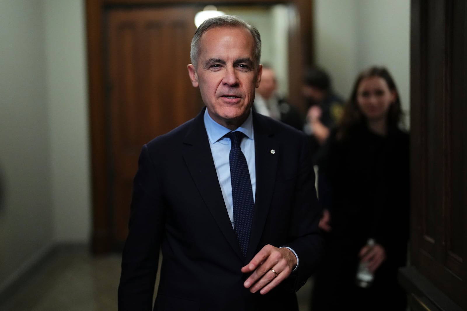 Canada Liberal Leader Mark Carney leaves a caucus meeting in Ottawa, Monday, March 10, 2025. (Sean Kilpatrick/The Canadian Press via AP)