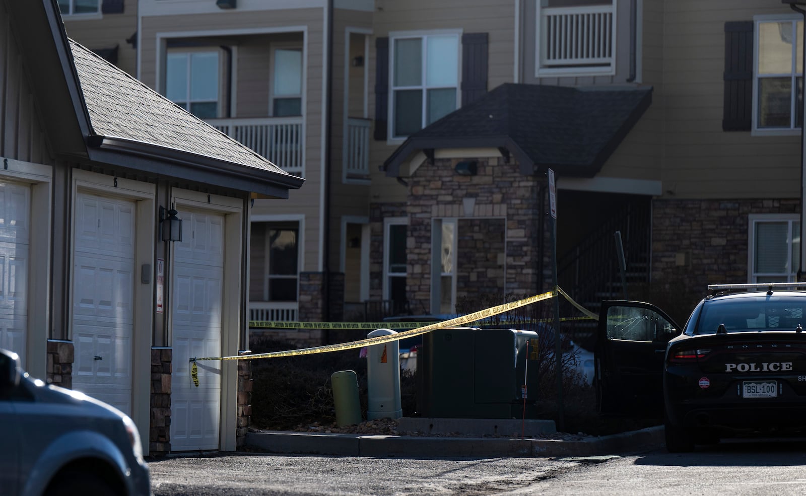 FILE - Police tape marks a crime scene where Colorado Springs police found children dead inside a condo of the Palomino Ranch Point complex after responding to a 911 call reporting a burglary on Tuesday, Dec. 19, 2023 in Colorado Springs, Colo. (Parker Seibold /The Gazette via AP, File)