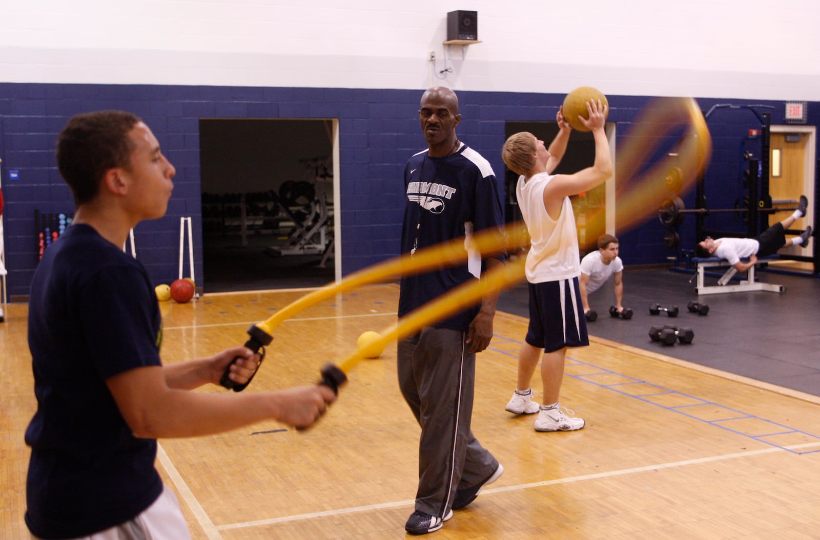 New assistant basketball coach Dwight Anderson helps out in the weight room at Fairmont High School on Monday, Oct. 24, 2011. Anderson, who was the greatest prep player ever from Dayton and was also a college star and NBA player, spent time on the streets, homeless ad was addicted to crack. He has come full circle, with the help of rehab, and is now coaching under head boys coach Hank Bias.