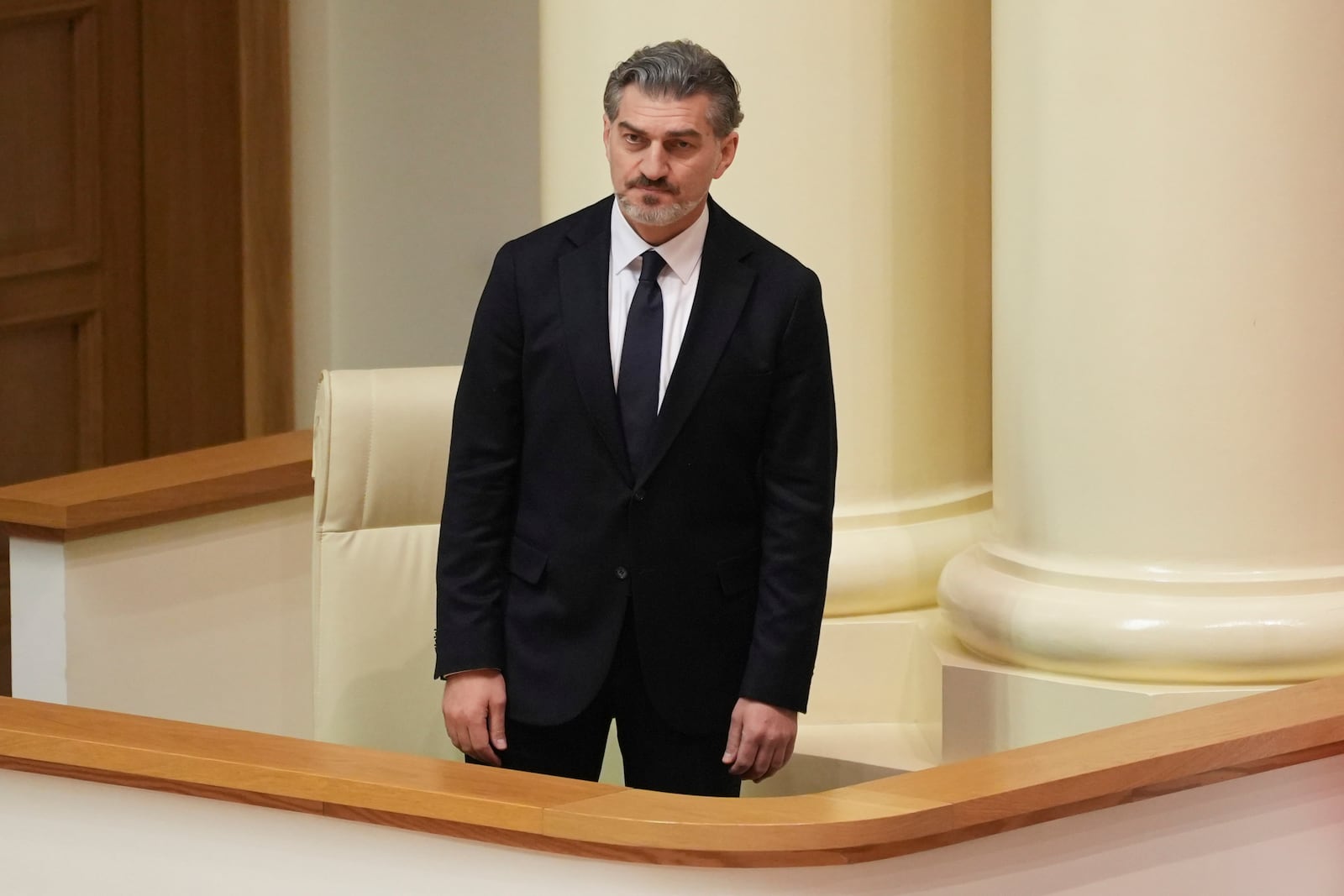 Georgian president-elect Mikheil Kavelashvili attends the Georgian parliament in Tbilisi, Georgia, Saturday. Dec. 14, 2024. (AP Photo)