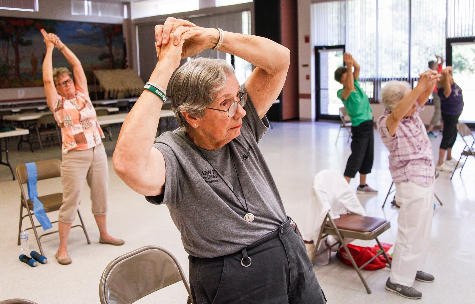 Older adults exercise at the Fairborn Senior Center. The majority of Ohioans 50 and older say concerns about health care will affect their vote this fall. CHRIS STEWART / STAFF