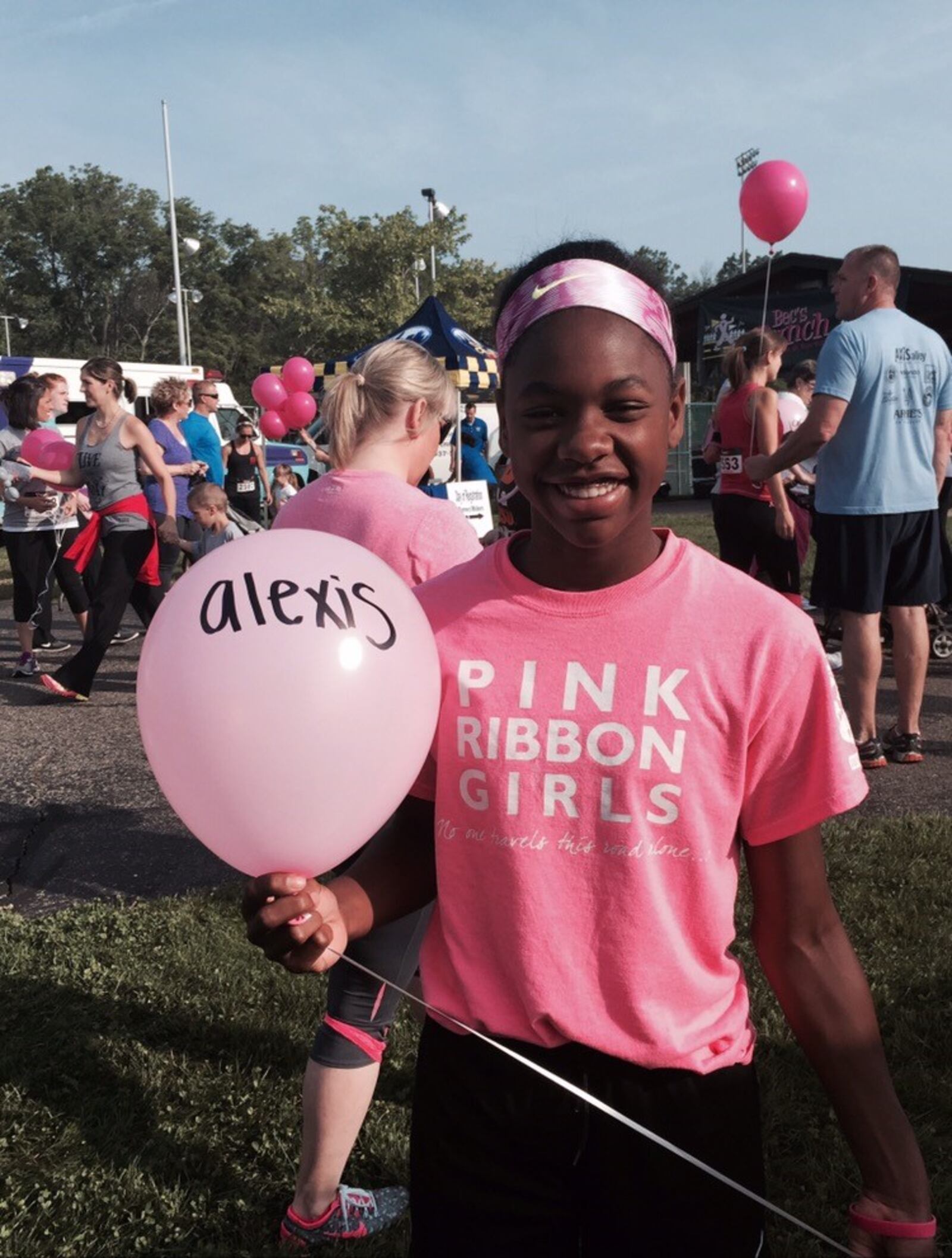 Lexi honoring the memory of her mother, Alexis, at a past Pink Ribbon Girls event. CONTRIBUTED