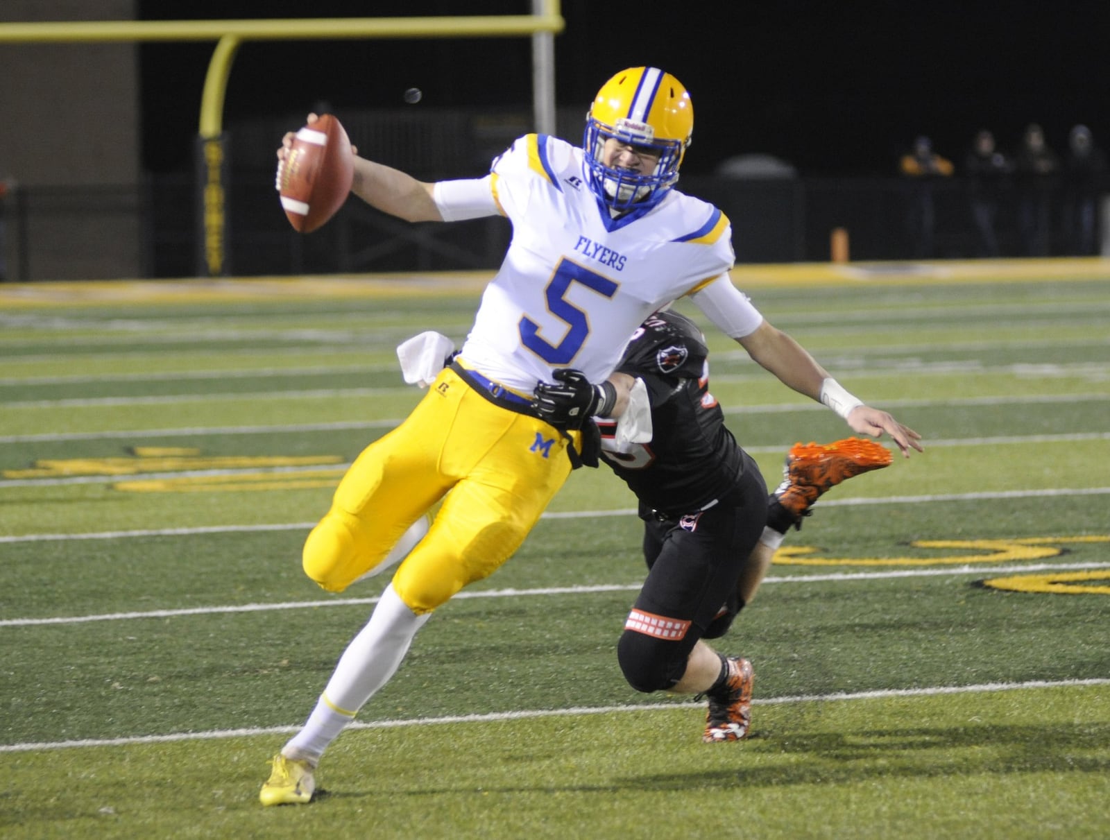 Marion Local QB Nathan Bruns had three TD passes in the first quarter and ran for another TD. Marion Local defeated Coldwater 40-19 in a D-VI, Region 24 final at Sidney on Friday, Nov. 16, 2018. MARC PENDLETON / STAFF