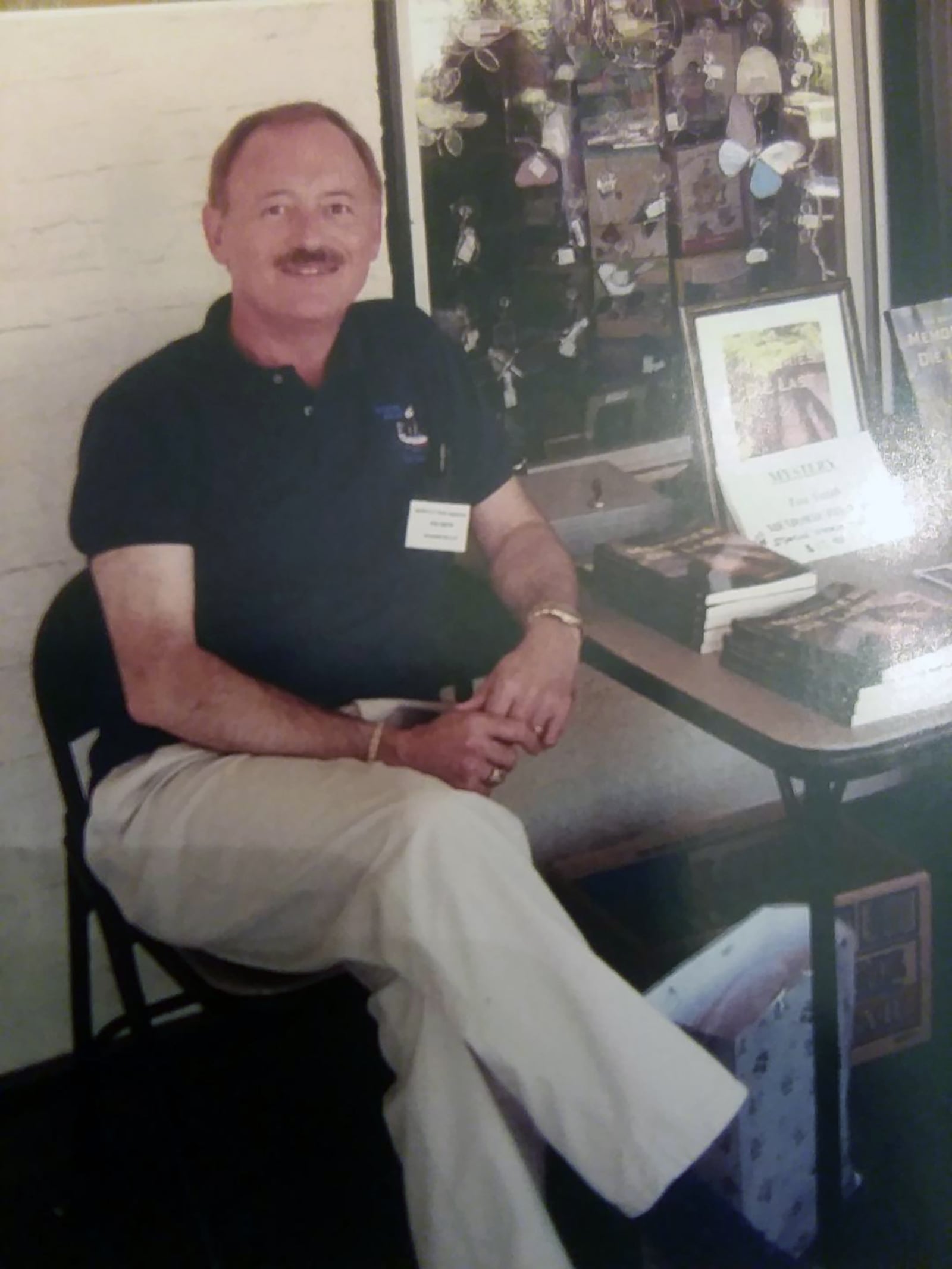 Smith at a book signing in Springboro in 2007. Getting readers to take his romance novels seriously since he is a man and wrote under his own name, was challenging. But he said the books have done well despite this.