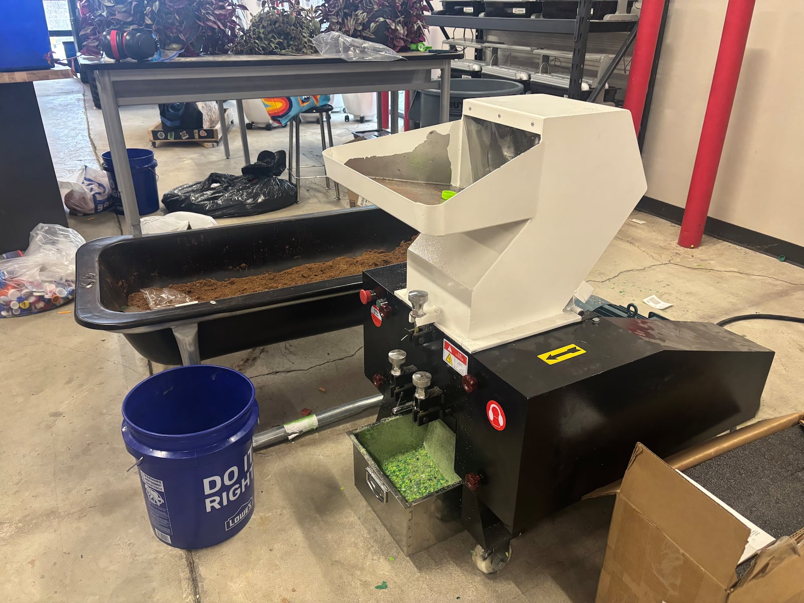 Students in the Northridge Career Tech Center's Parks and Rec program are working to recycle bottle caps into the plastic needed for 3D printin. Eileen McClory / staff