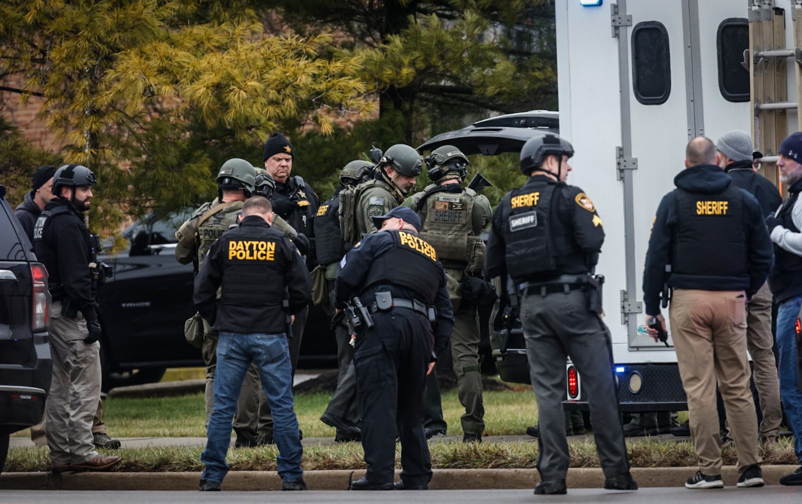 Law enforcement from multiple jurisdictions are involved in a standoff Friday, Dec. 20, 2024, at an apartment complex off Shiloh Springs Road in Trotwood. JIM NOELKER/STAFF