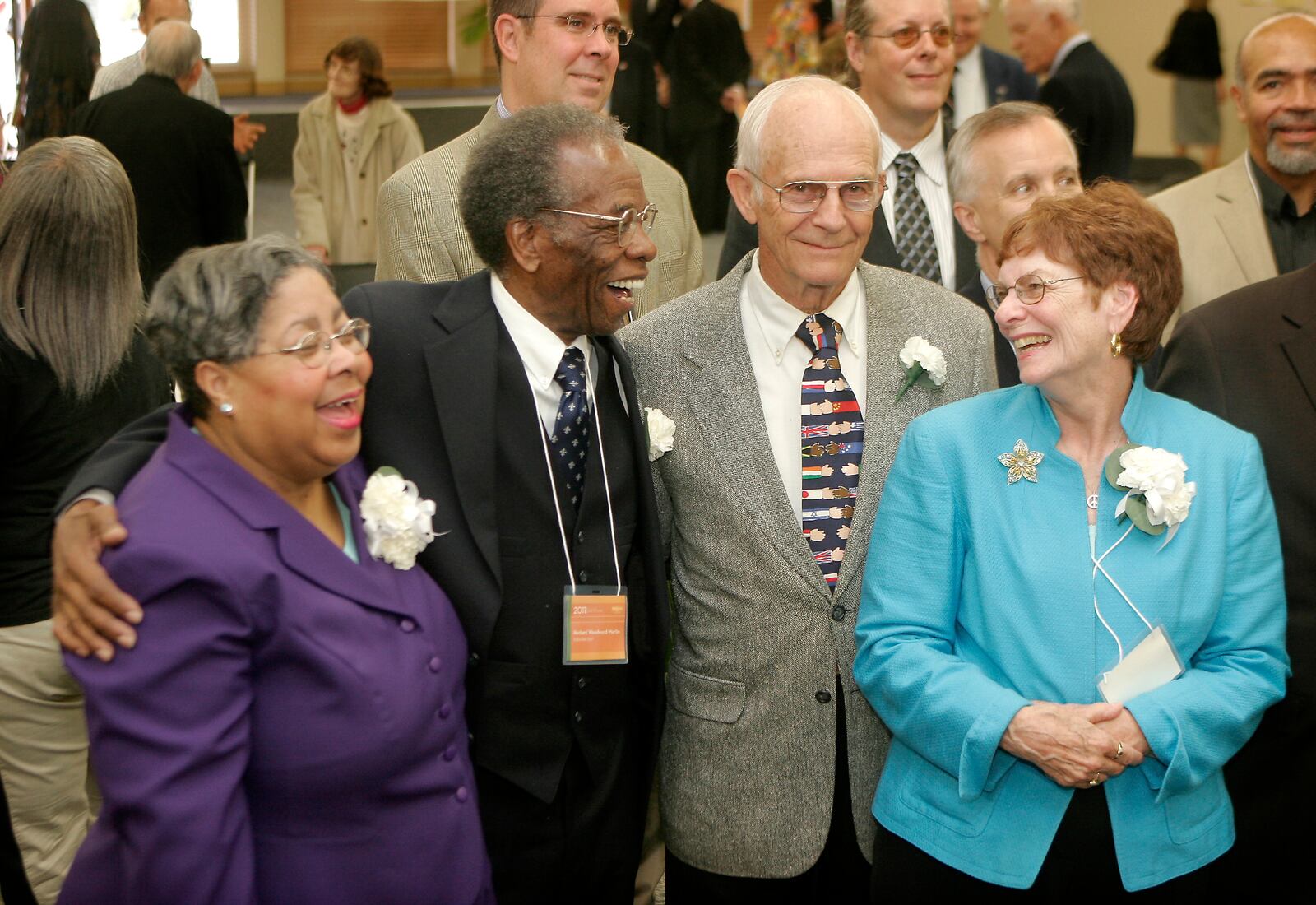 Pat Meadows (from left) and Walk of Fame inductees Herbert Woodward Martin, Ralph Dull and Christine Dull gather for a photo  at the close of the 2011 Dayton Region's Walk of Fame induction ceremony. STAFF FILE PHOTO