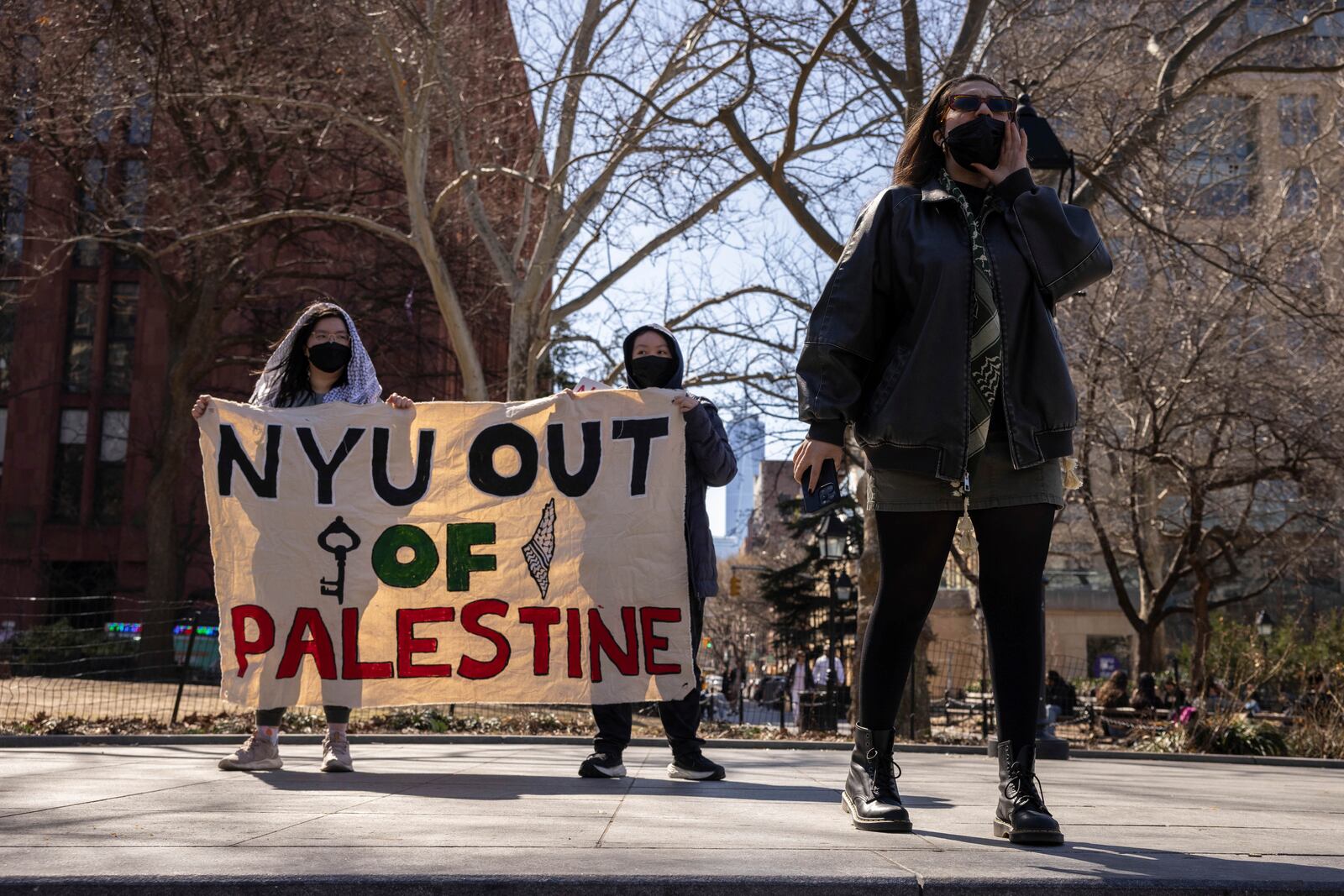 A protester including students of New York University gather for a demonstration in support of Palestinian activist Mahmoud Khalil at Washington Square Park, Tuesday, March 11, 2025, in New York. (AP Photo/Yuki Iwamura)