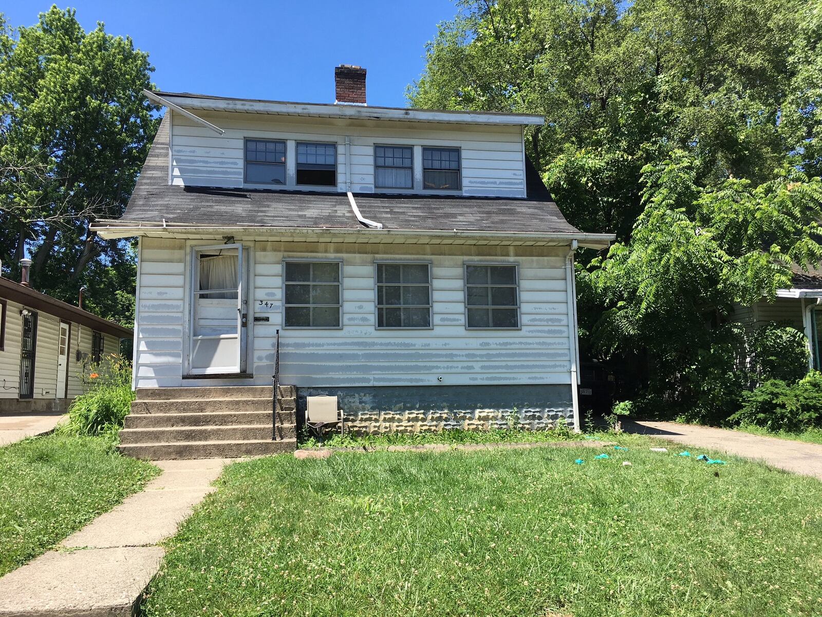 Dayton police shot a suspect in front of this home in the 300 block of Verona Road on Wednesday, June 6, 2018. DARIN POPE / STAFF