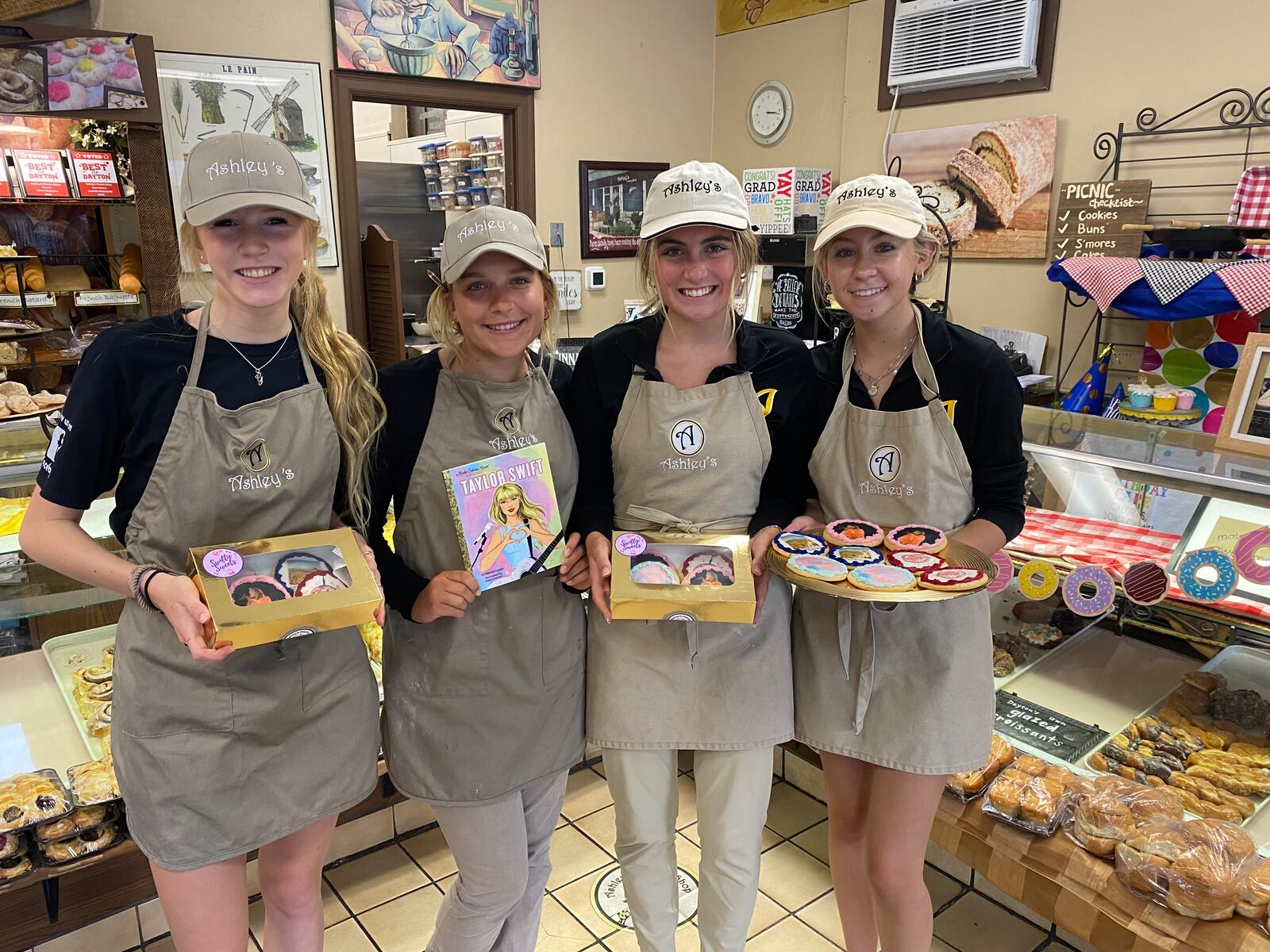 Ashley's Pastry Shop is offering four packs of Taylor Swift cookies boxed in gold boxes  ahead of her concert in Cincinnati (CONTRIBUTED PHOTO).