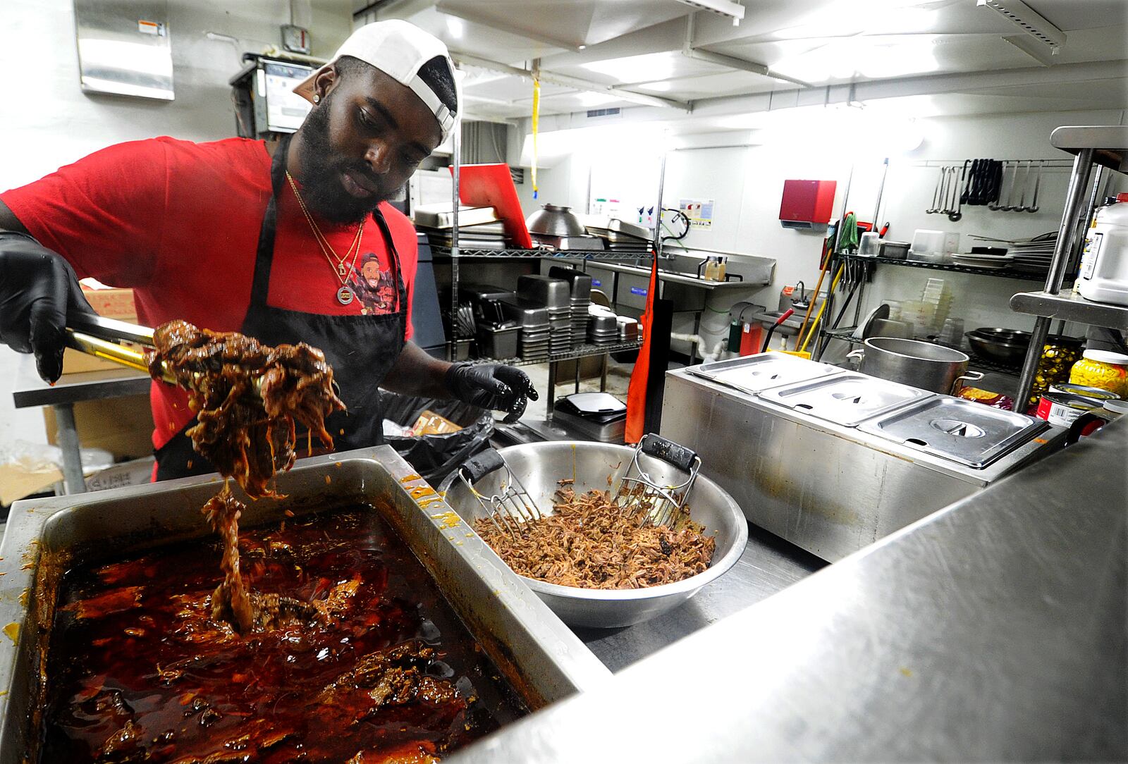 Chef Darion Lewis, prepares taco meat for taco Tuesday Sept. 20, 2022. MARSHALL GORBY\STAFF