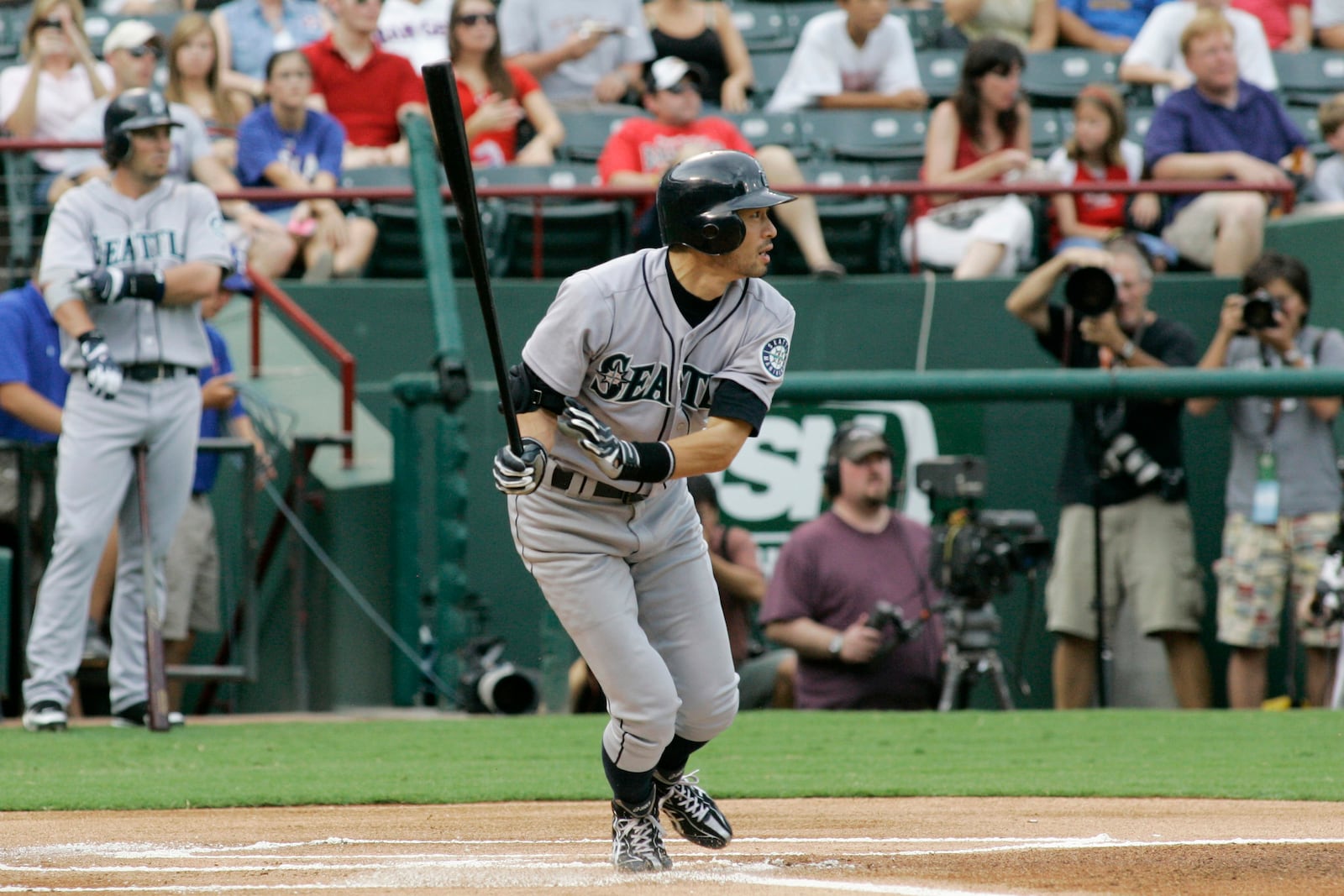 FILE - Seattle Mariners' Ichiro Suzuki follows through after hitting his 3,000th career hit in the first inning of a baseball game against the Texas Rangers, Tuesday, July 29, 2008, in Arlington, Texas.(AP Photo/Matt Slocum, File)