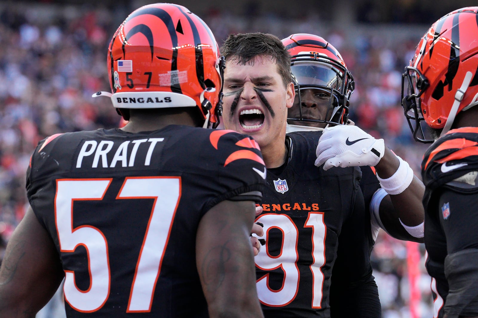 Cincinnati Bengals linebacker Germaine Pratt (57) celebrates with defensive end Trey Hendrickson (91) during the second half of an NFL football game against the Las Vegas Raiders in Cincinnati, Sunday, Nov. 3, 2024. (AP Photo/Jeff Dean)