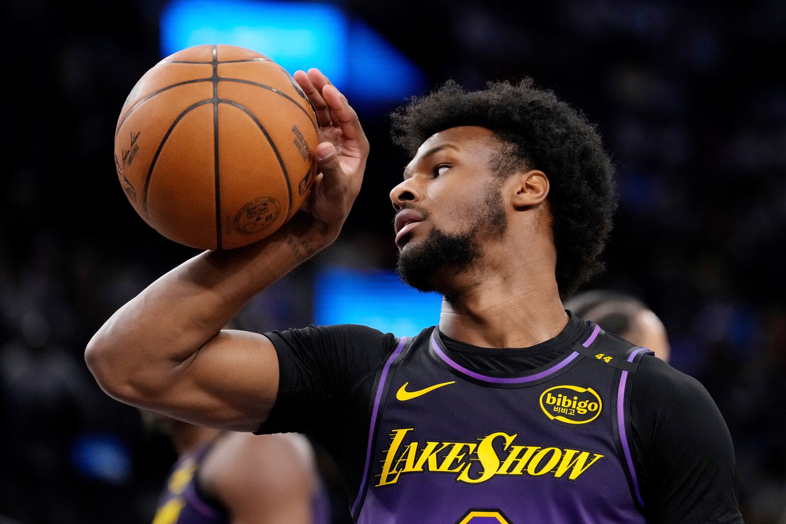 Los Angeles Lakers guard Bronny James grabs the ball after the Los Angeles Clippers scored during the second half of an NBA basketball game, Sunday, Jan. 19, 2025, in Inglewood, Calif. (AP Photo/Mark J. Terrill)