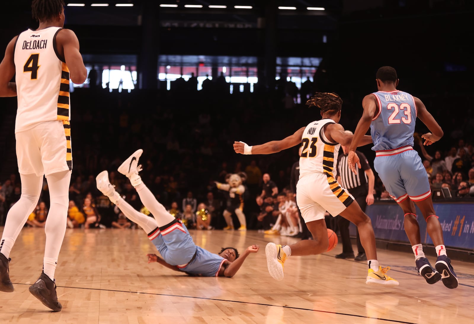 Dayton's Malachi Smith falls to the floor chasing a loose ball against Virginia Commonwealth in the Atlantic 10 Conference championship game on Saturday, March 12, 2023, at the Barclays Center in Brooklyn, N.Y. David Jablonski/Staff