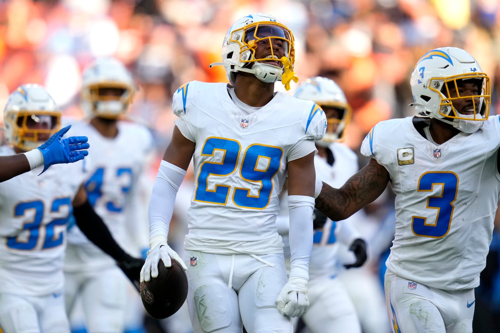 Los Angeles Chargers cornerback Tarheeb Still (29) celebrates after intercepting a pass against the Cleveland Browns in the second half of an NFL football game Sunday, Nov. 3, 2024, in Cleveland. (AP Photo/Sue Ogrocki)