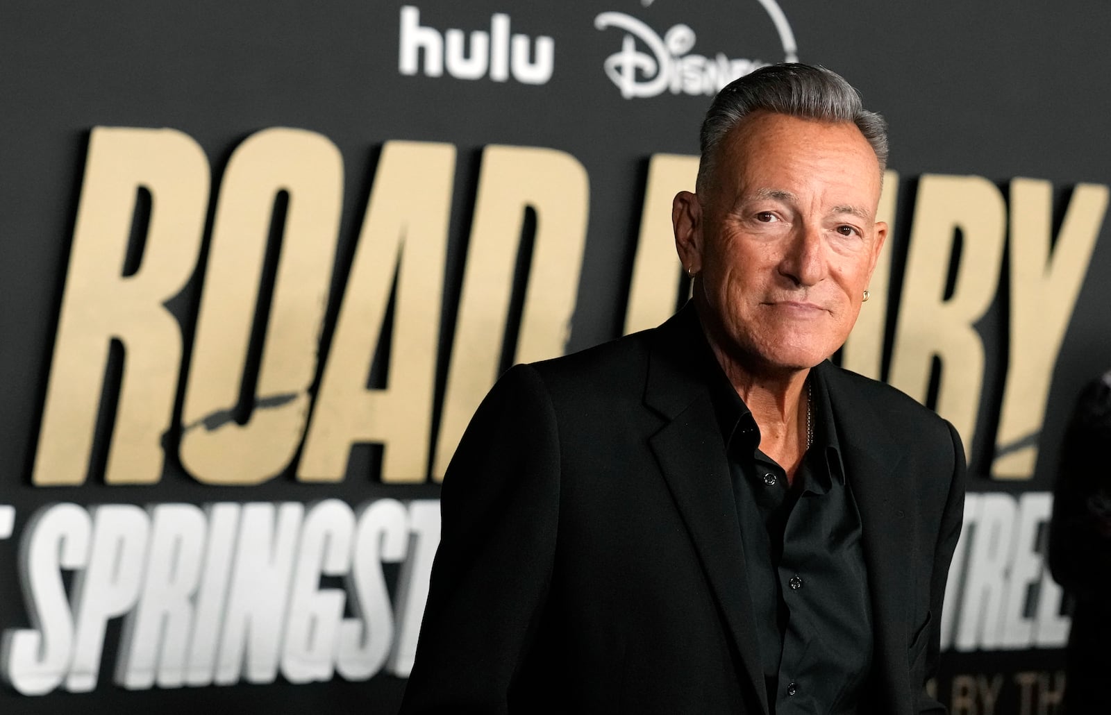 Bruce Springsteen poses at the premiere of the documentary film "Road Diary: Bruce Springsteen and the E Street Band," Monday, Oct. 21, 2024, at The Academy Museum of Motion Pictures in Los Angeles. (AP Photo/Chris Pizzello)