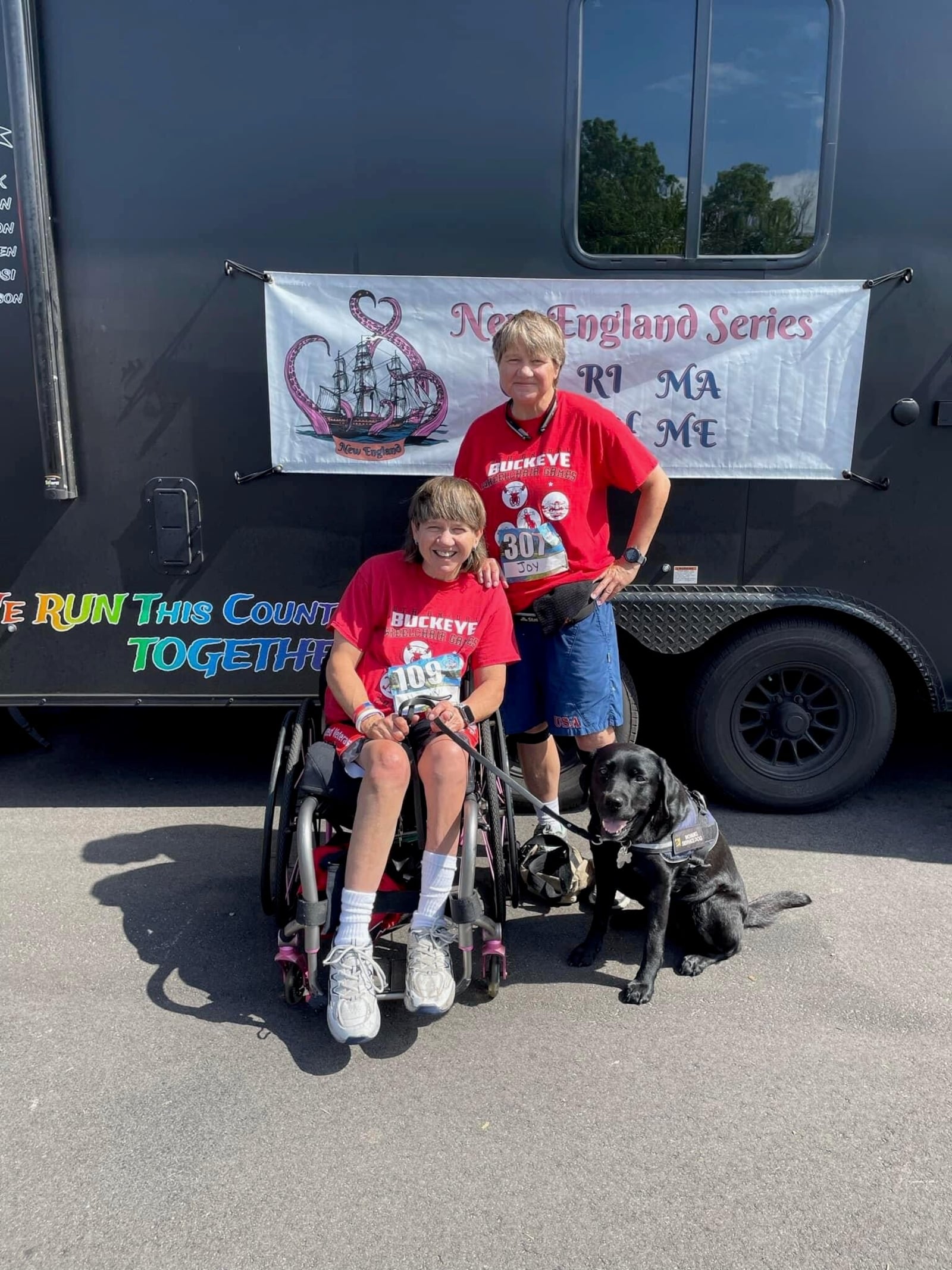 dentical twins Holly (left) and Joy Koester with Holly’s service dog Flare. This past spring Holly and Joy raced in 6 marathons/half marathons in 6 days in 6 different states as part of the Mainly Marathons competitions. Joy retired from the Army as a full bird colonel after 27 years in the service. Holly was a captain in the Army when she was paralyzed in an auto accident as she was preparing to deploy to Desert Storm. CONTRIBUTED