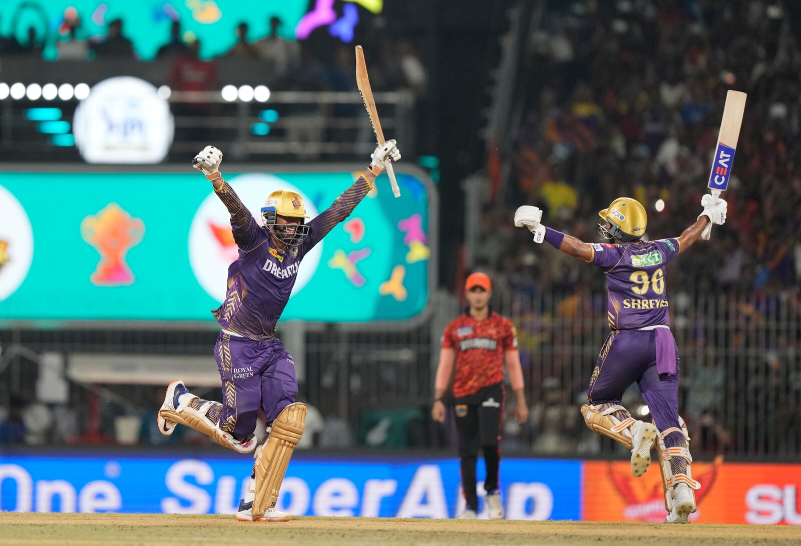 FILE - Kolkata Knight Riders' captain Shreyas Iyer , left, with teammate Venkatesh Iyer celebrate after wining against Sunrisers Hyderabad during the Indian Premier League cricket final match in Chennai, India, Sunday, May 26, 2024. (AP Photo/Mahesh Kumar A., File)