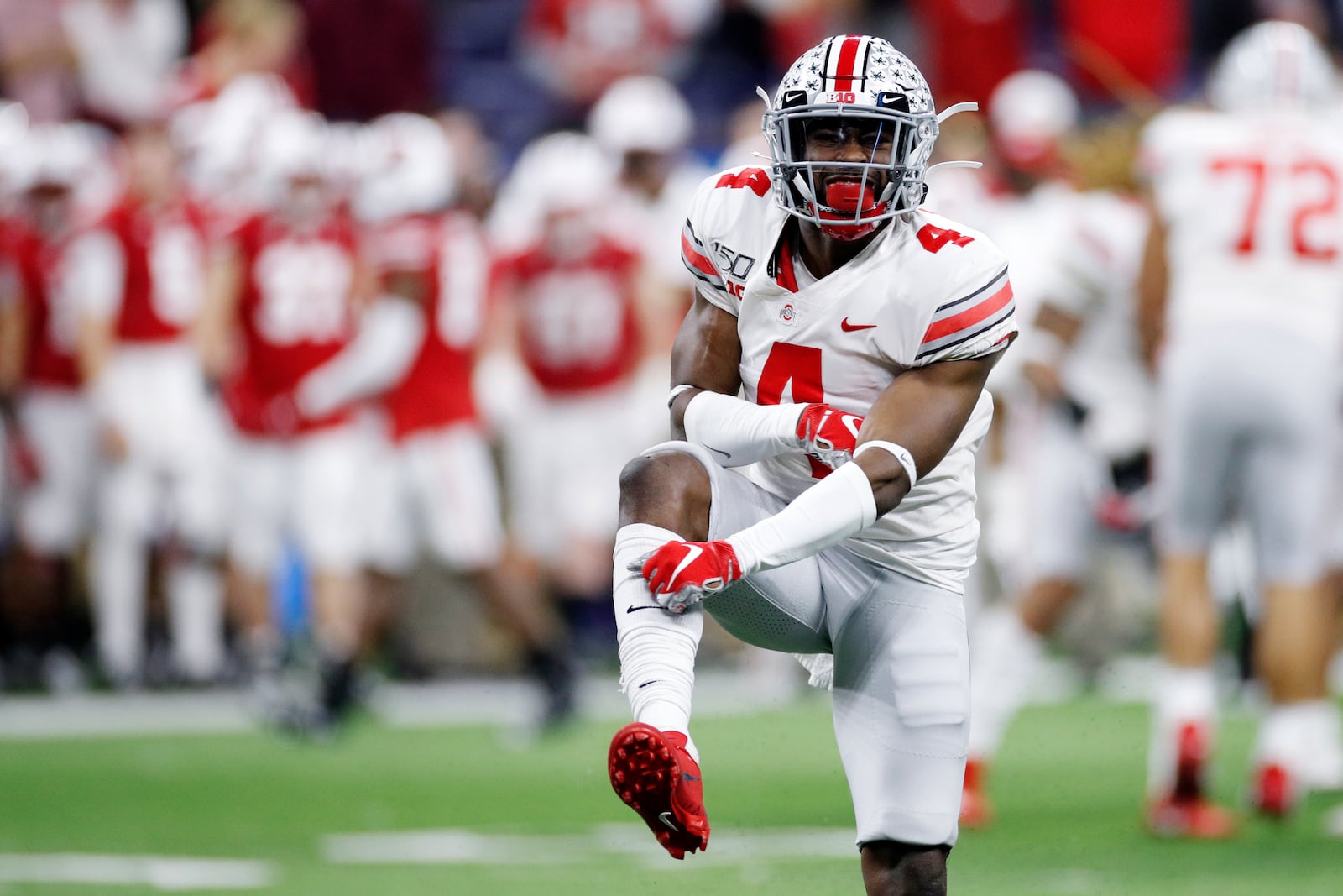 INDIANAPOLIS, IN - DECEMBER 07: Jordan Fuller #4 of the Ohio State Buckeyes celebrates in the fourth quarter against the Wisconsin Badgers during the Big Ten Football Championship at Lucas Oil Stadium on December 7, 2019 in Indianapolis, Indiana. Ohio State defeated Wisconsin 34-21. (Photo by Joe Robbins/Getty Images)