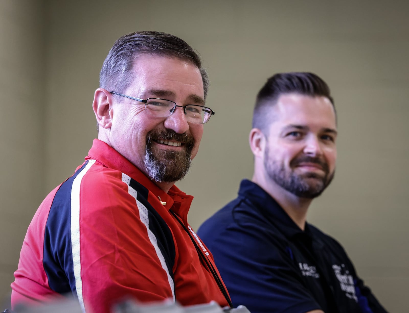 Dayton Air Show Media Team Ken Kreitzer, left and Dayton Air Show Chief Medical Officer and Medical Director Dr. Brandon Amburgey spend countless hours preparing for the big air show weekend. JIM NOELKER/STAFF