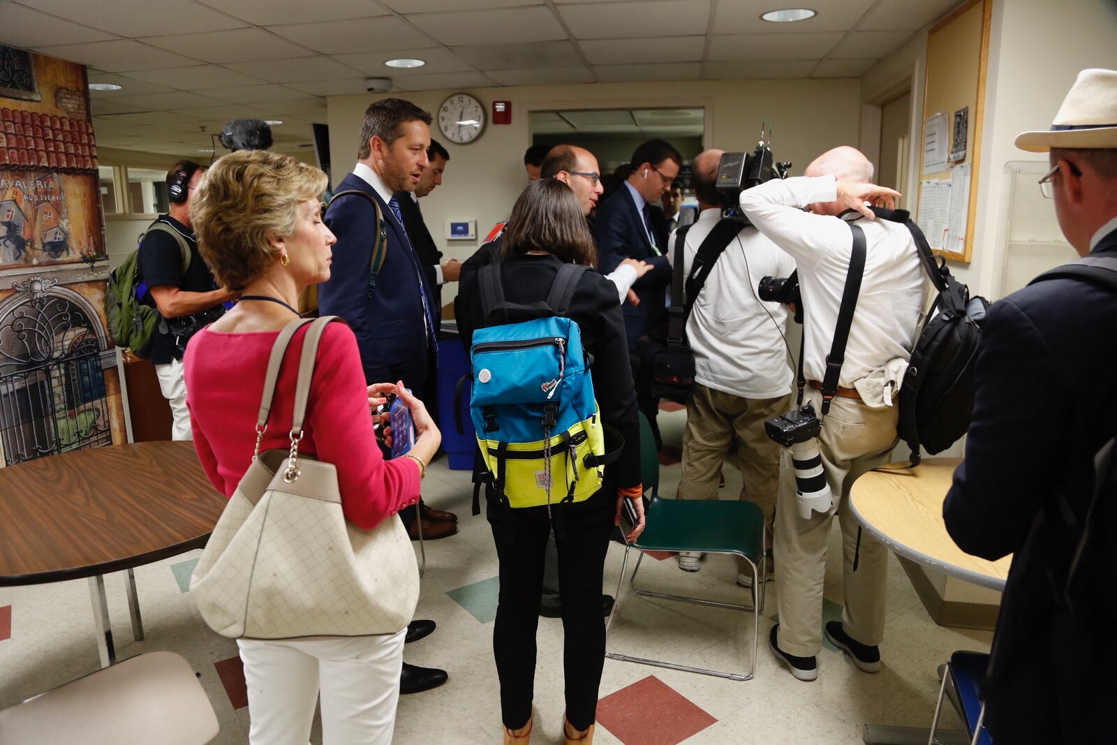 WHIO's Cheryl McHenry waits at Miami Valley Hospital during President Donald Trump's visit. Photo by Ty Greenlees.