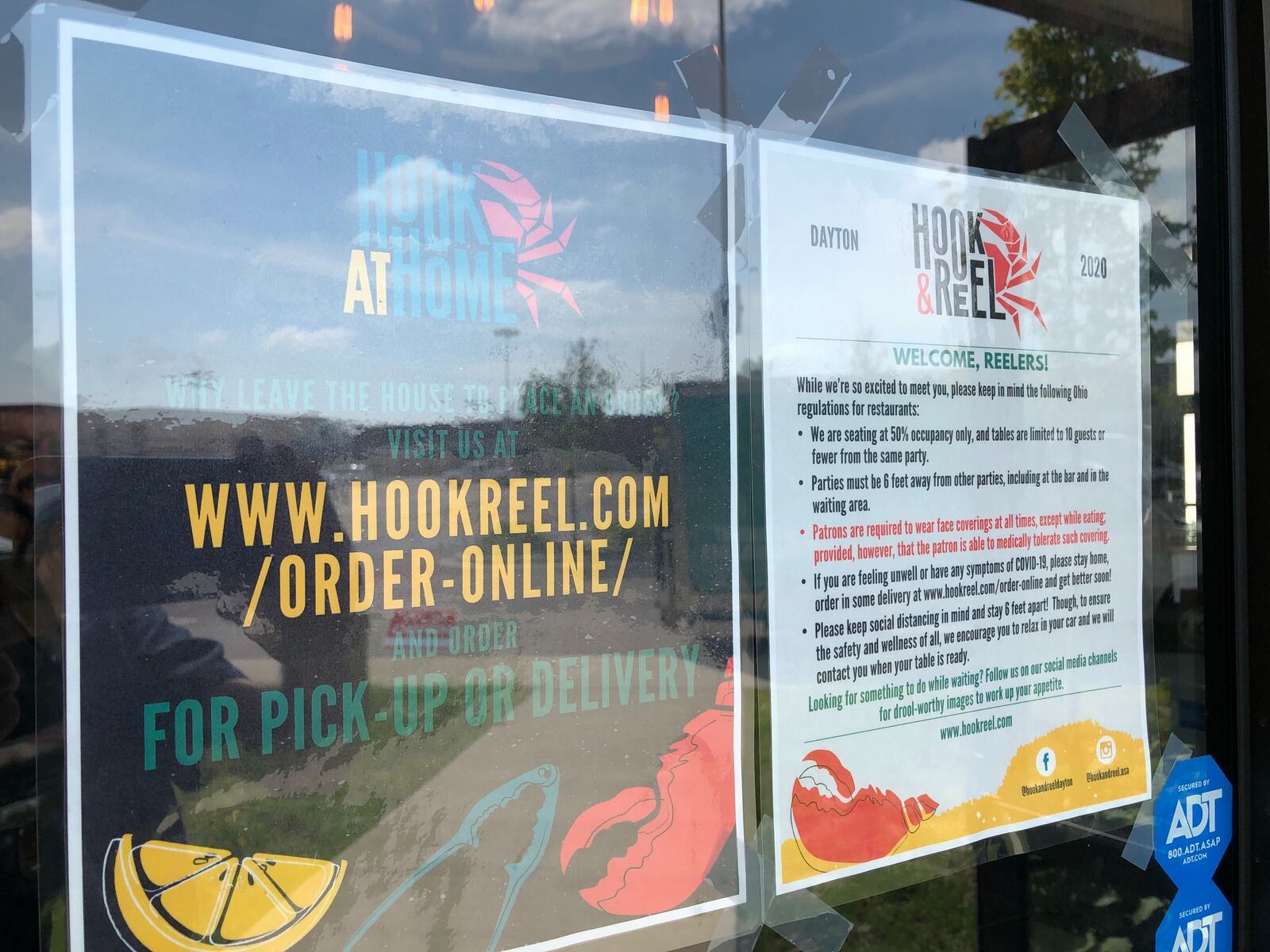 A new seafood restaurant, Hook & Reel Cajun Seafood & Bar, opens today, Aug. 18, 2020, in the building that formerly housed a Sears Tire & Auto center at the Dayton Mall. Hook & Reel shares the building with Outback Steakhouse, which opened last year. MARK FISHER/STAFF