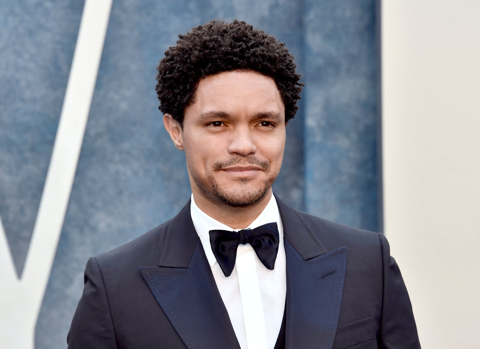 FILE - Trevor Noah arrives at the Vanity Fair Oscar Party on March 12, 2023, in Beverly Hills, Calif. (Photo by Evan Agostini/Invision/AP, File)