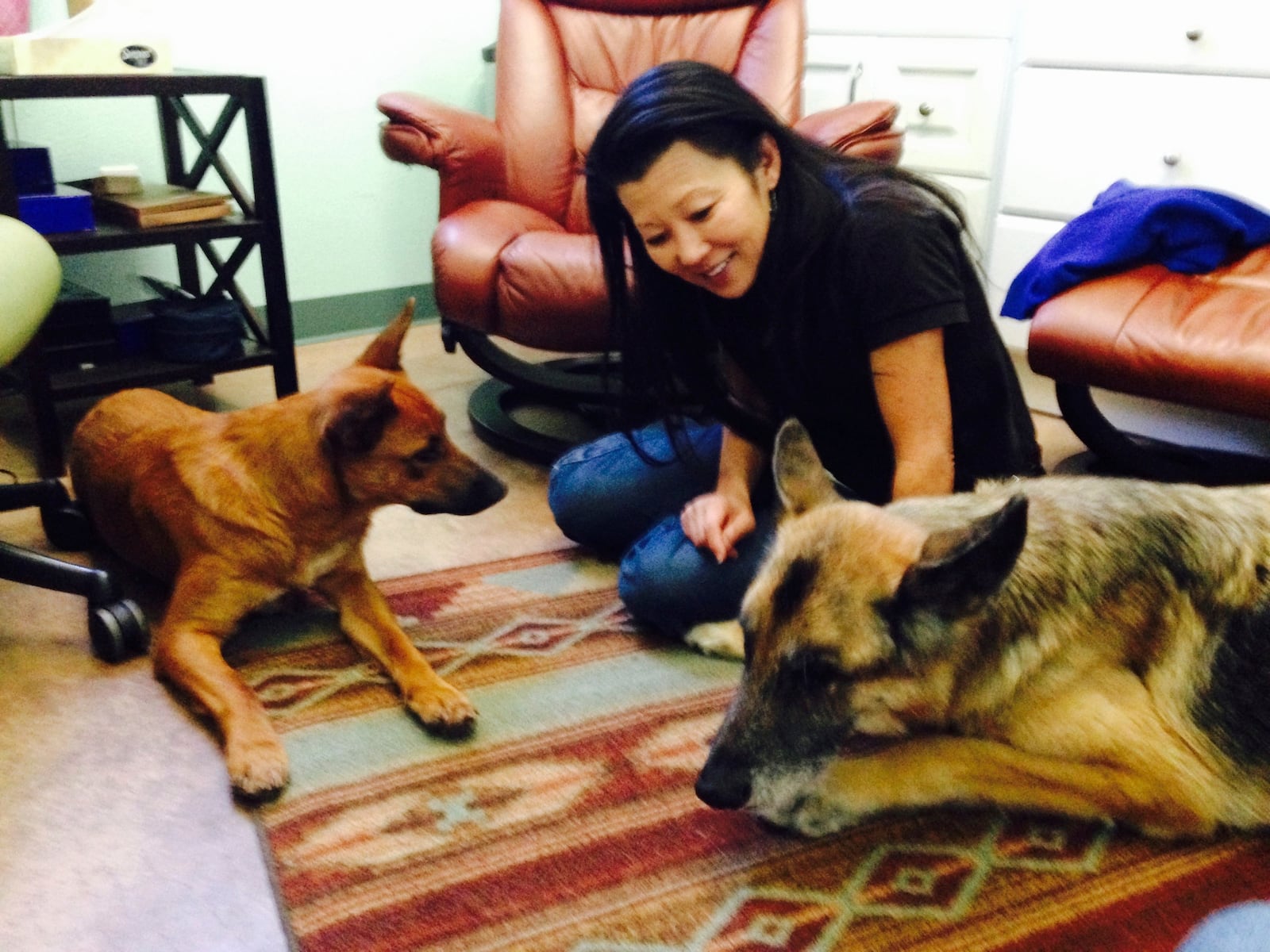 This undated photo provided by Sherry Gaber shows Betsy Arakawa with her dogs Zinna, left, and Bear, in Santa Fe, N.M. (Sherry Gaber via AP)