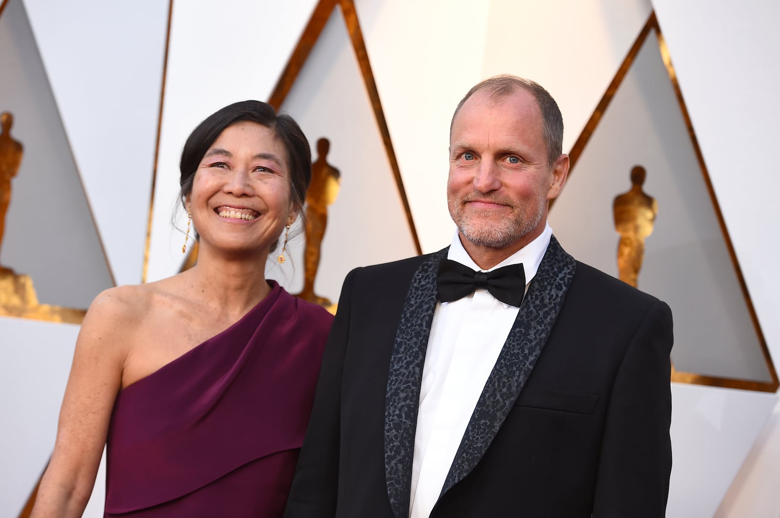 Laura Louie, left, and Woody Harrelson arrive at the Oscars on Sunday, March 4, 2018, at the Dolby Theatre in Los Angeles. (Photo by Jordan Strauss/Invision/AP)