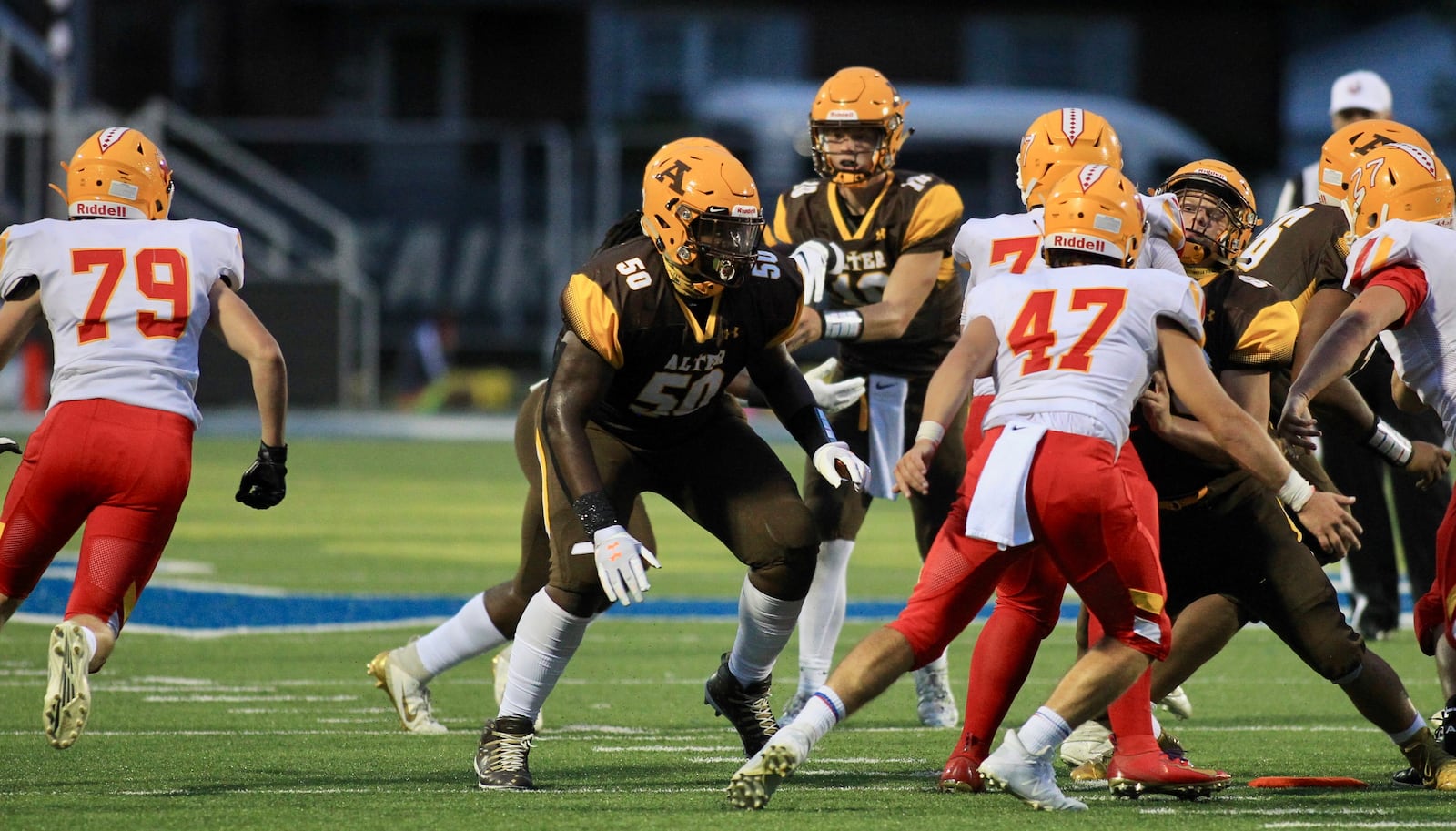 Alter's Derrick Shepard Jr. (50) blocks against Fenwick on Friday, Sept. 11, 2020, at Roush Stadium in Kettering. David Jablonski/Staff