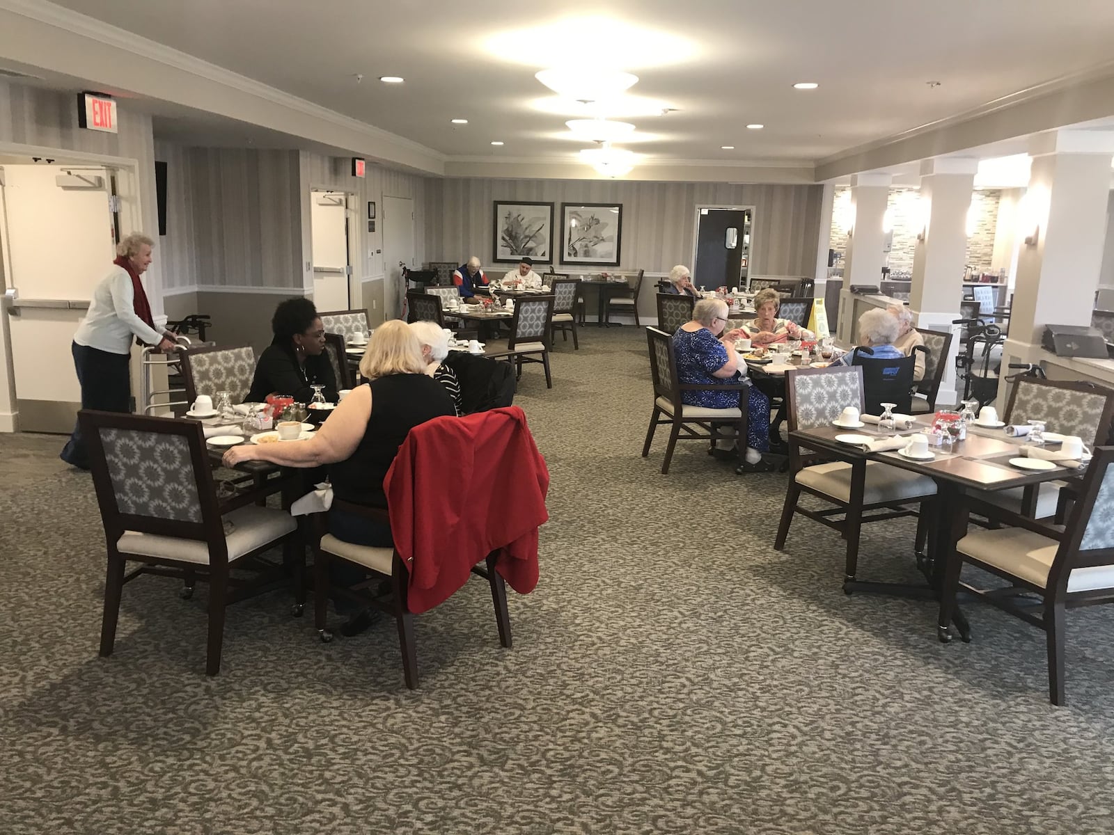 Residents at Tapestry Senior Living in Springboro gather for lunch. About 40 residents have moved in since the facility opened in July.