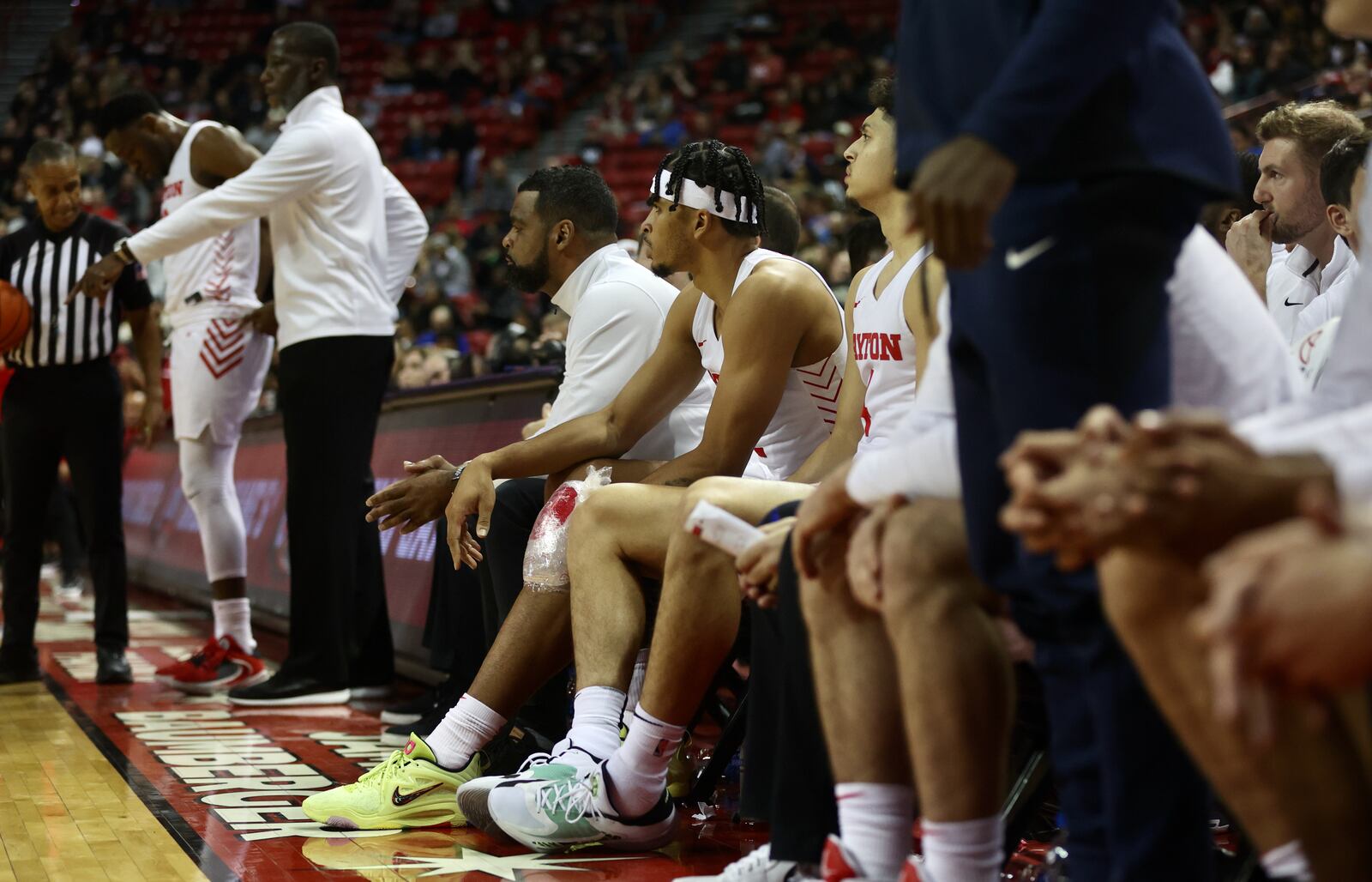 Dayton's Toumani Camara sits on the bench with a knee injury in the second half during a game against UNLV on Tuesday, Nov. 15, 2022, at the Thomas & Mack Center in Las Vegas, Nev. David Jablonski/Staff