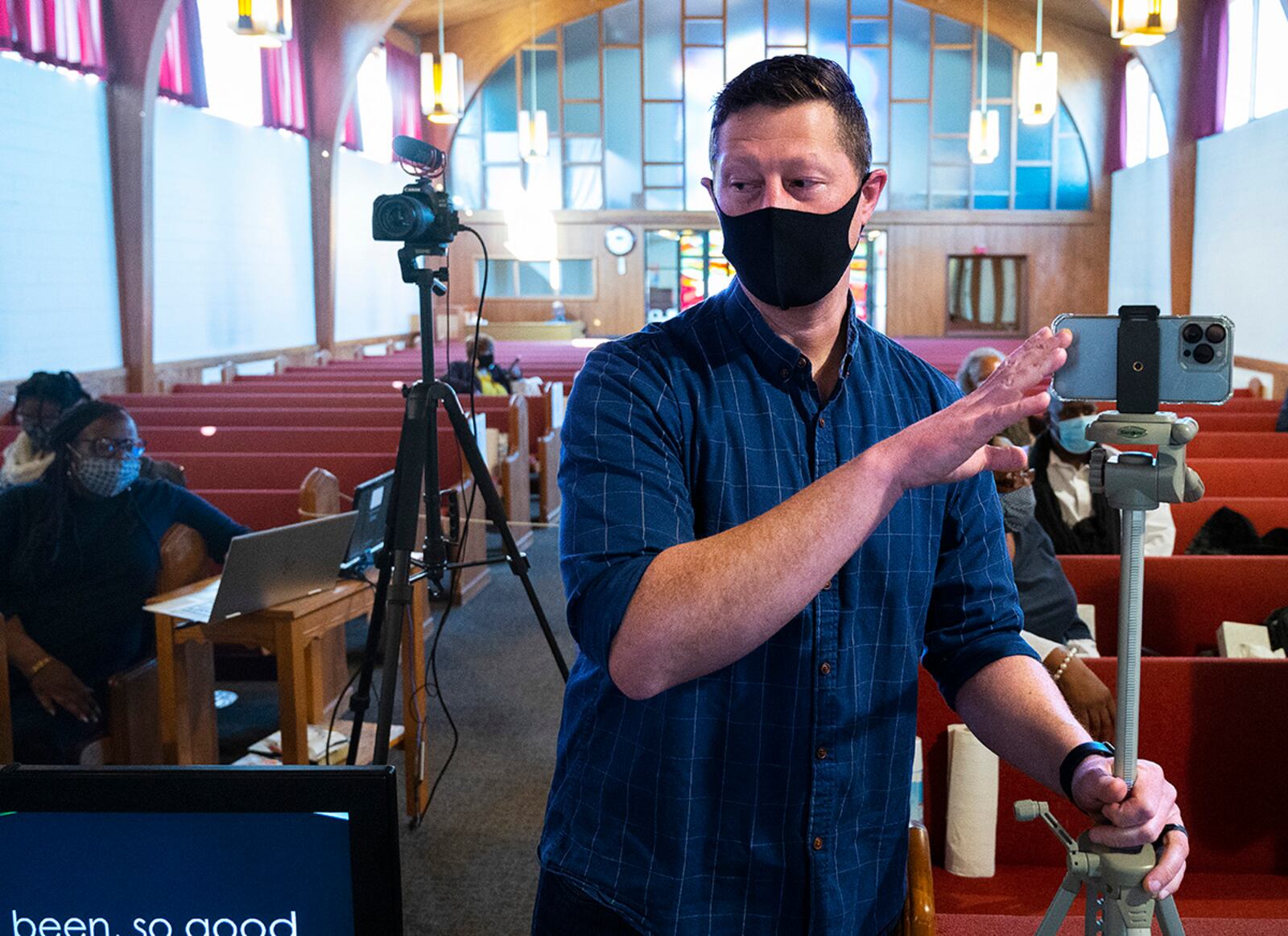 Chaplain (Capt.) Cliff Mullen, 88th Air Base Wing, sets up his phone to livestream the Protestant service Feb. 27 from Kittyhawk Chapel at Wright-Patterson Air Force Base. U.S. AIR FORCE PHOTO/R.J. ORIEZ