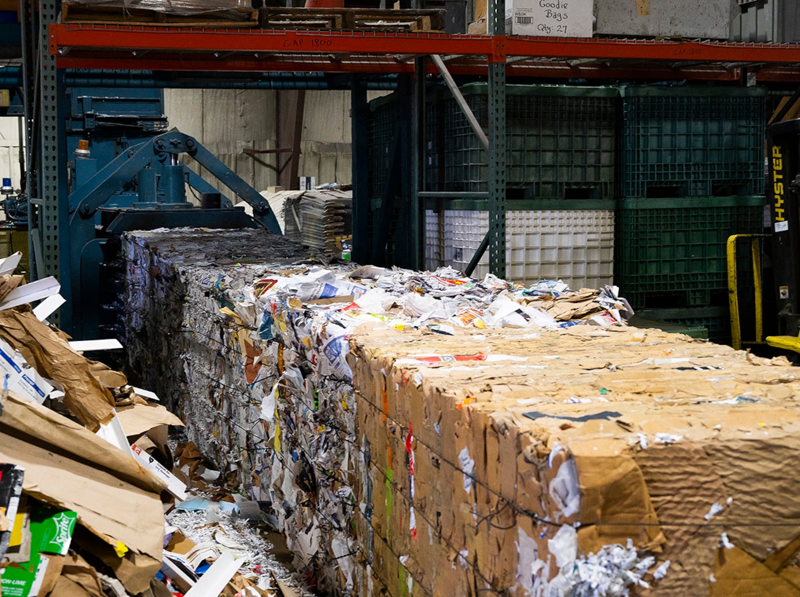 Separate bales of corrugated cardboard and mixed paper sit outside the baler Sept. 22 in the Wright-Patterson Air Force Base Recycling Center. Once a month, the recycling program opens up bids to sell various commodities based on the center’s supply. U.S. AIR FORCE PHOTO/R.J. ORIEZ