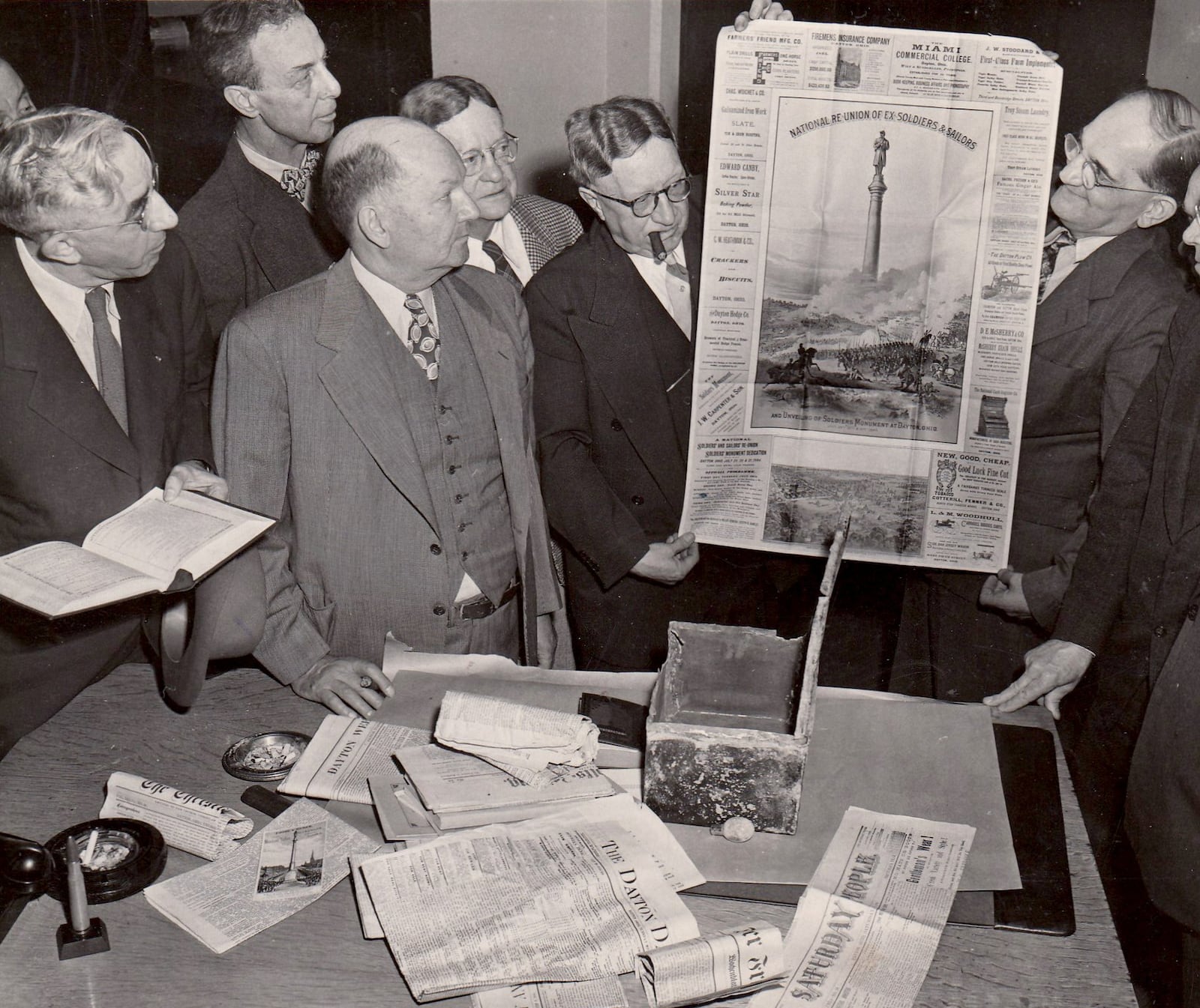 A time capsule, buried within the base of the Civil War Soldiers Monument, was opened in 1948. Among the items found inside were “copies of all daily and weekly newspapers of the day, the annual reports of the Board of Health and Police Department, a copy of the city directory for 1883 and a large color picture of the unveiling of the monument,” according to the Dayton Daily News. DAYTON DAILY NEWS ARCHIVE