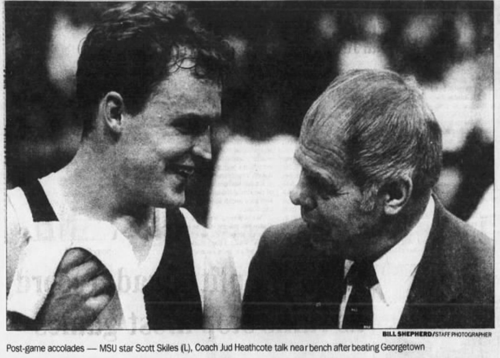 Scott Skiles, left, and Jud Heathcote, of Michigan State, talk after a victory against Georgetown in the 1985 NCAA tournament at UD Arena. Photo by Bill Shepherd