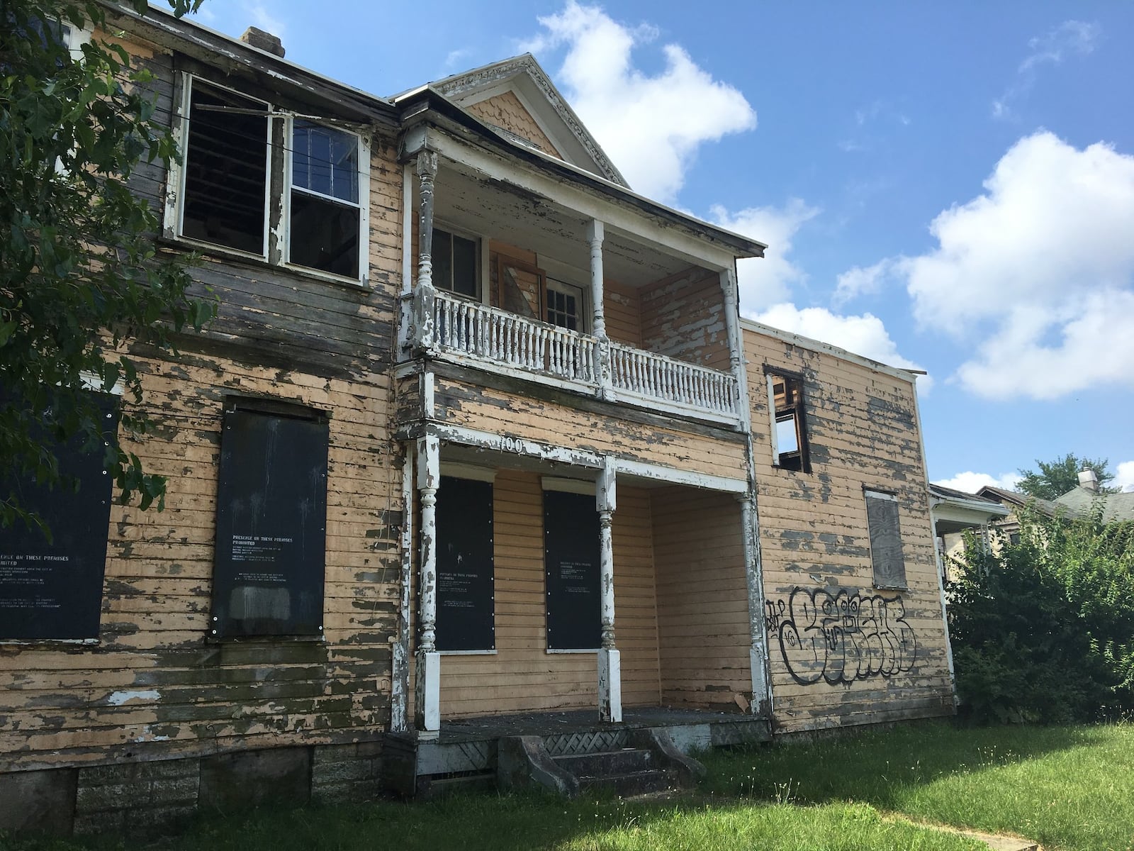 Parts of east Dayton still struggle with housing abandonment. This is one of a variety of vacant and dilapidated homes near Fourth and Garfield streets. CORNELIUS FROLIK / Staff