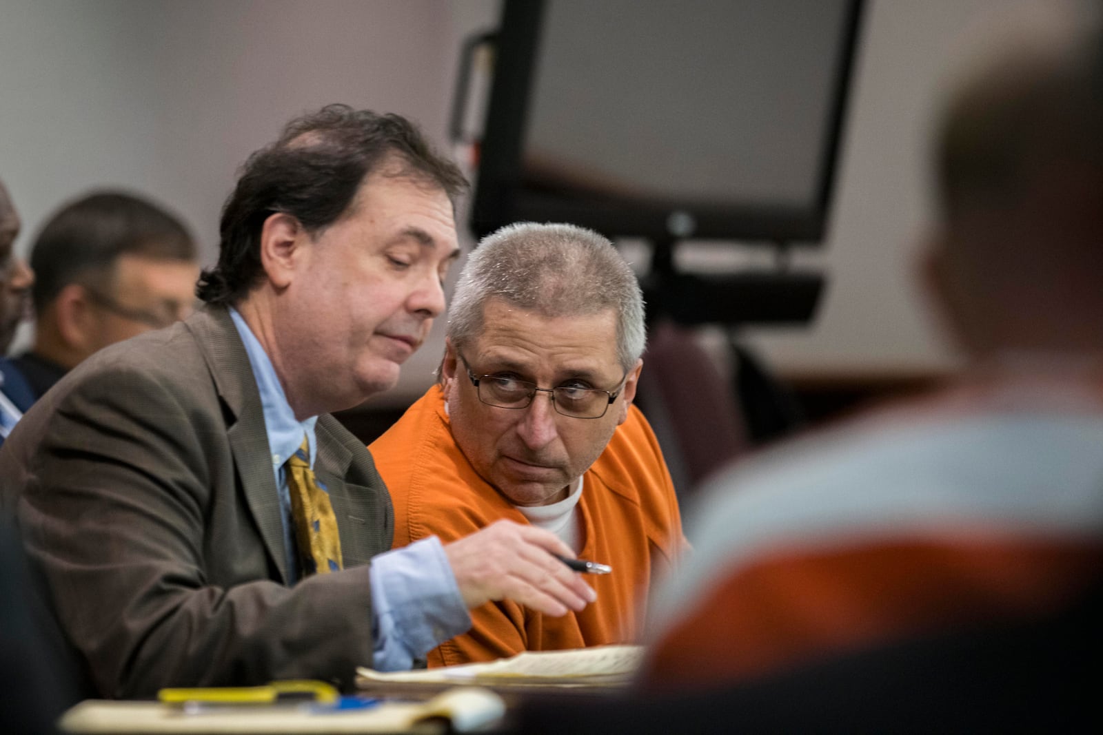 William "Roddie" Bryan, center, sits with his attorney before a hearing challenging his conviction of killing Ahmaud Arbery in 2020, Thursday, Oct. 24, 2024, in Brunswick, Ga. (AP Photo/Stephen B. Morton)