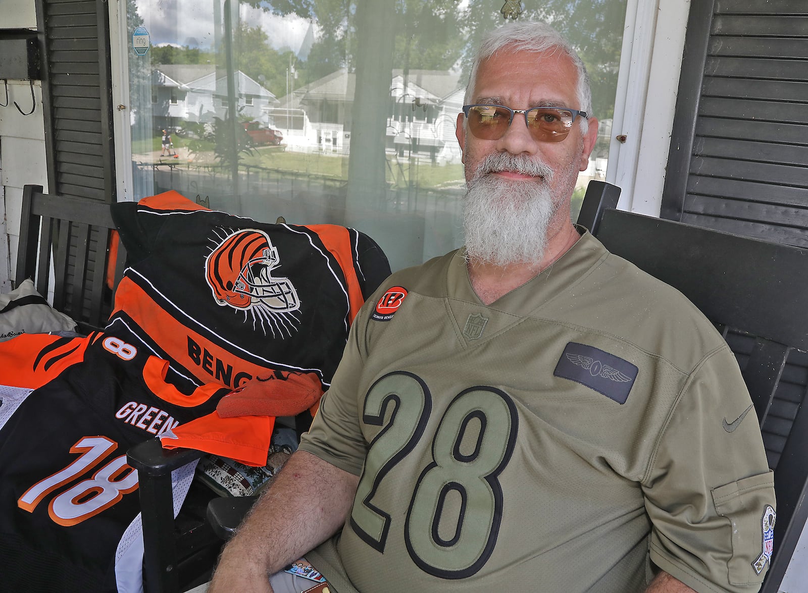 Jeremy Stewart, of Springfield, who has been a Bengals fan for two decades, said he is confident the team will return to the postseason and win the Super Bowl. BILL LACKEY/STAFF