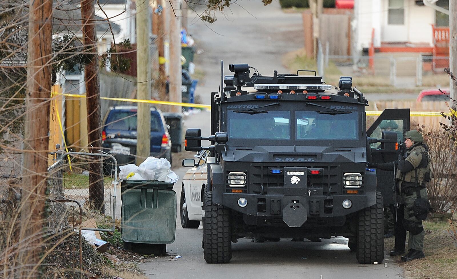 A SWAT standoff on East Third Street in Dayton ended after nearly seven hours with a man being taken into police custody. No injuries were reported during the standoff. MARSHALL GORBY\STAFF