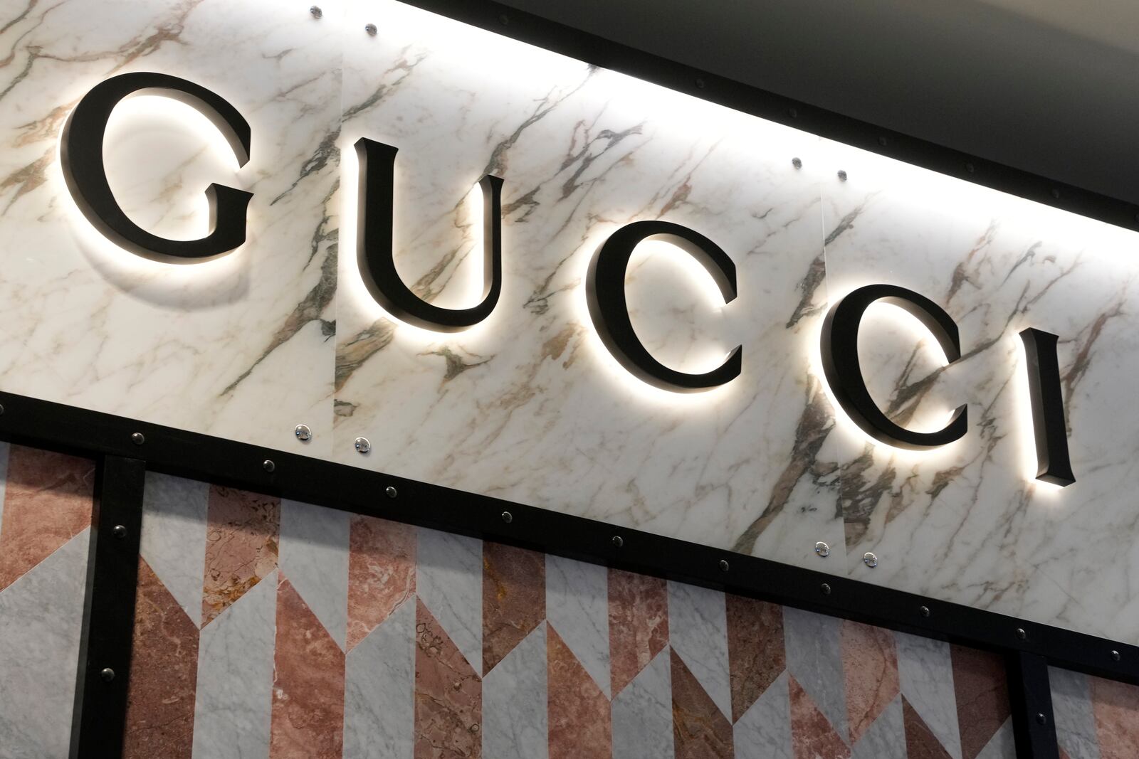 FILE - This is the sign on a Gucci store in Pittsburgh on Monday, Jan. 30, 2023. (AP Photo/Gene J. Puskar, File)