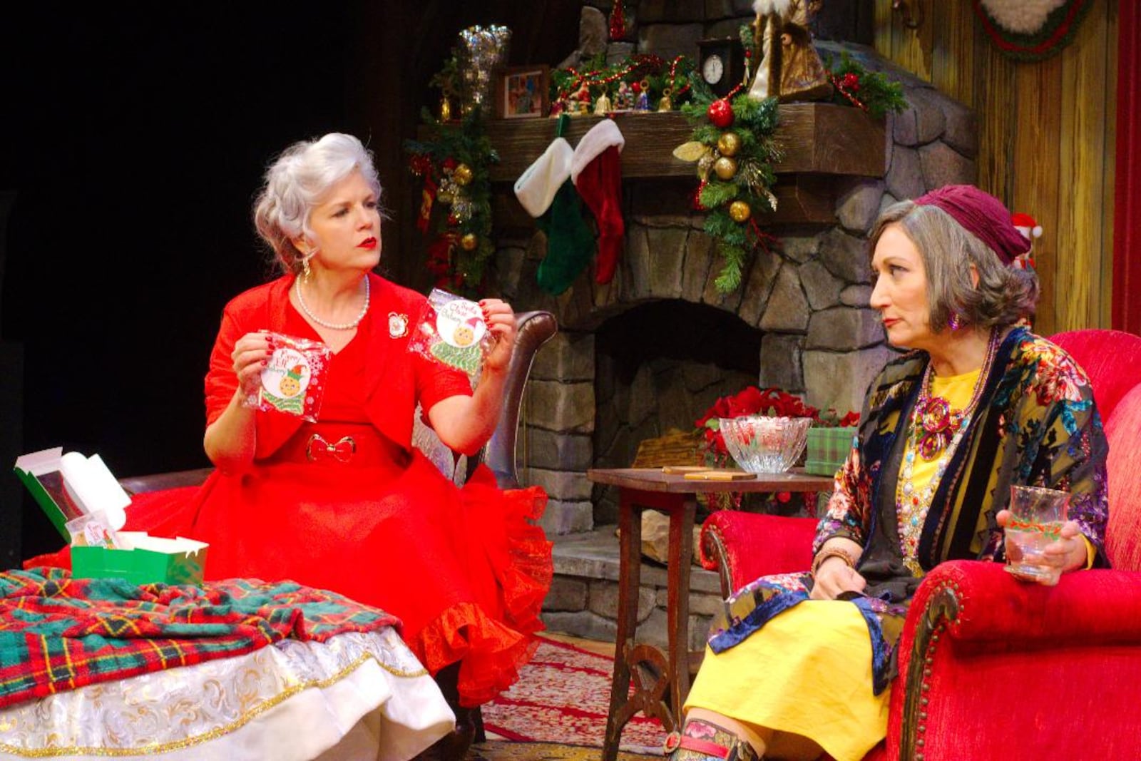 Christine Brunner (left as Noel Claus) and Mierka Girten (Sharon) in the Human Race Theatre Company's production of "A Frosty Night" through Dec. 22. PHOTO BY RAY GEIGER