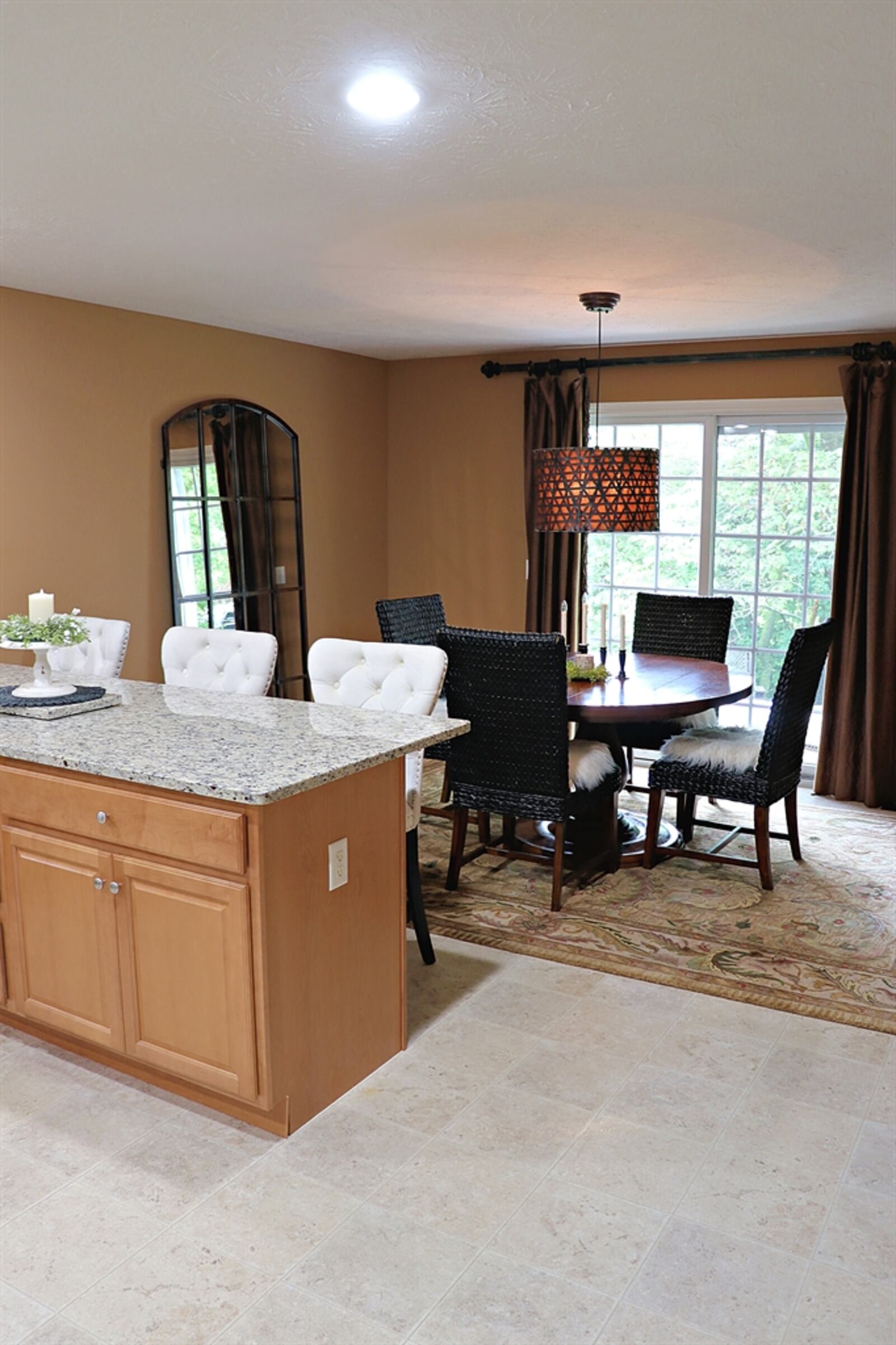 The dining room area features high-quality vinyl flooring.