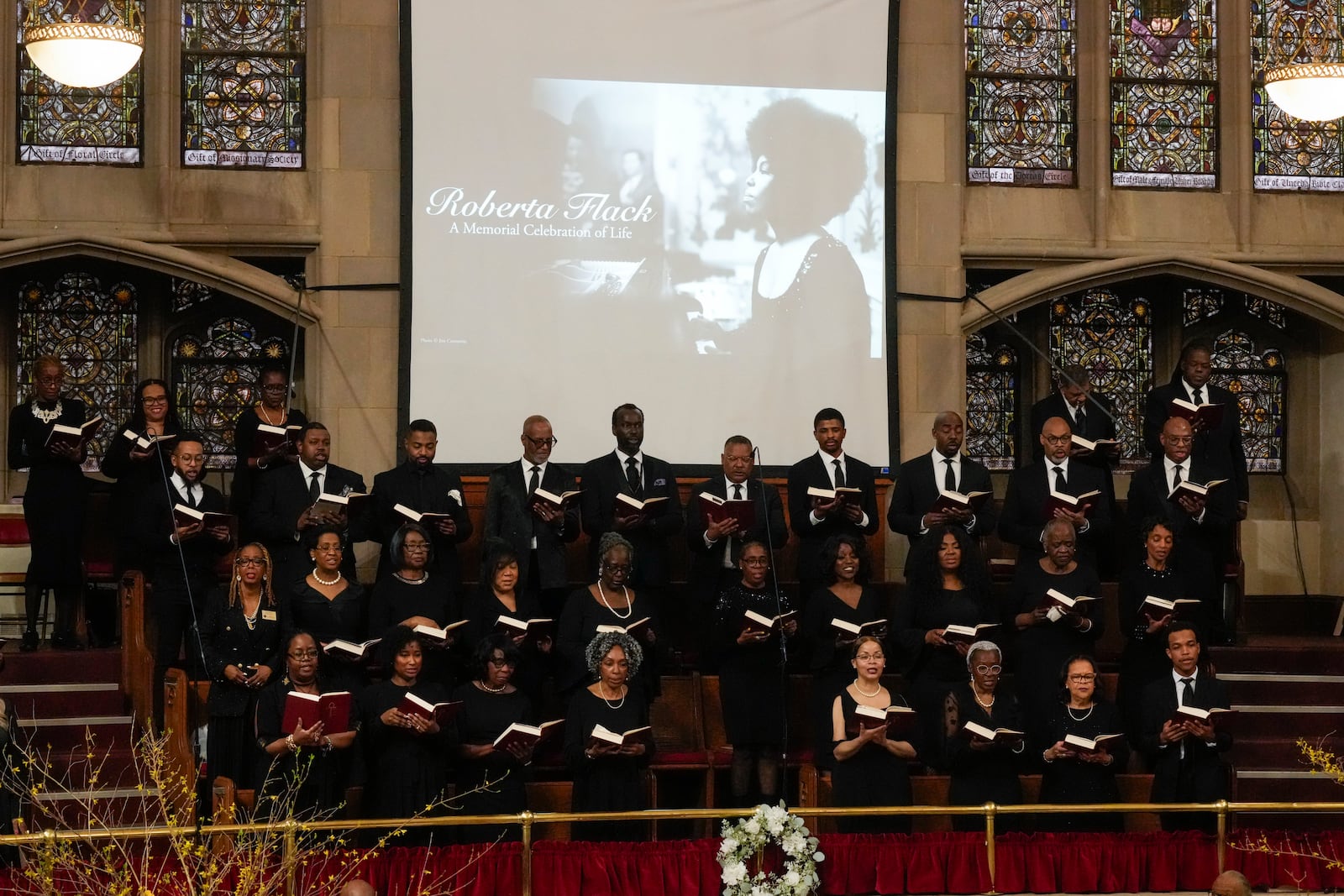 A choir performs during a ceremony in celebration of Roberta Flack's life at The Abyssinian Baptist Church on Monday, March 10, 2025, in New York. (AP Photo/Richard Drew)