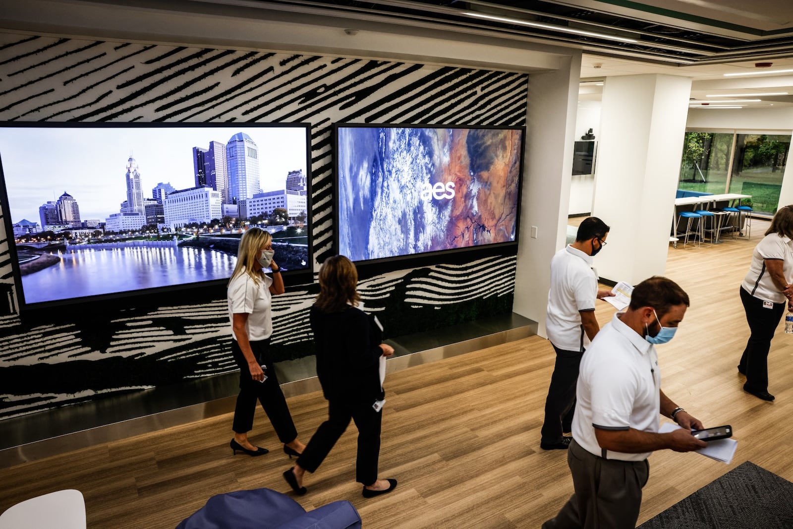 AES held a ribbon cutting on it's newly renovated, Smart Operations Center,  Monday October 25, 2021. AES spent $20 million to renovate the old Dayton Power & Light building and move AES into the future. JIM NOELKER/STAFF