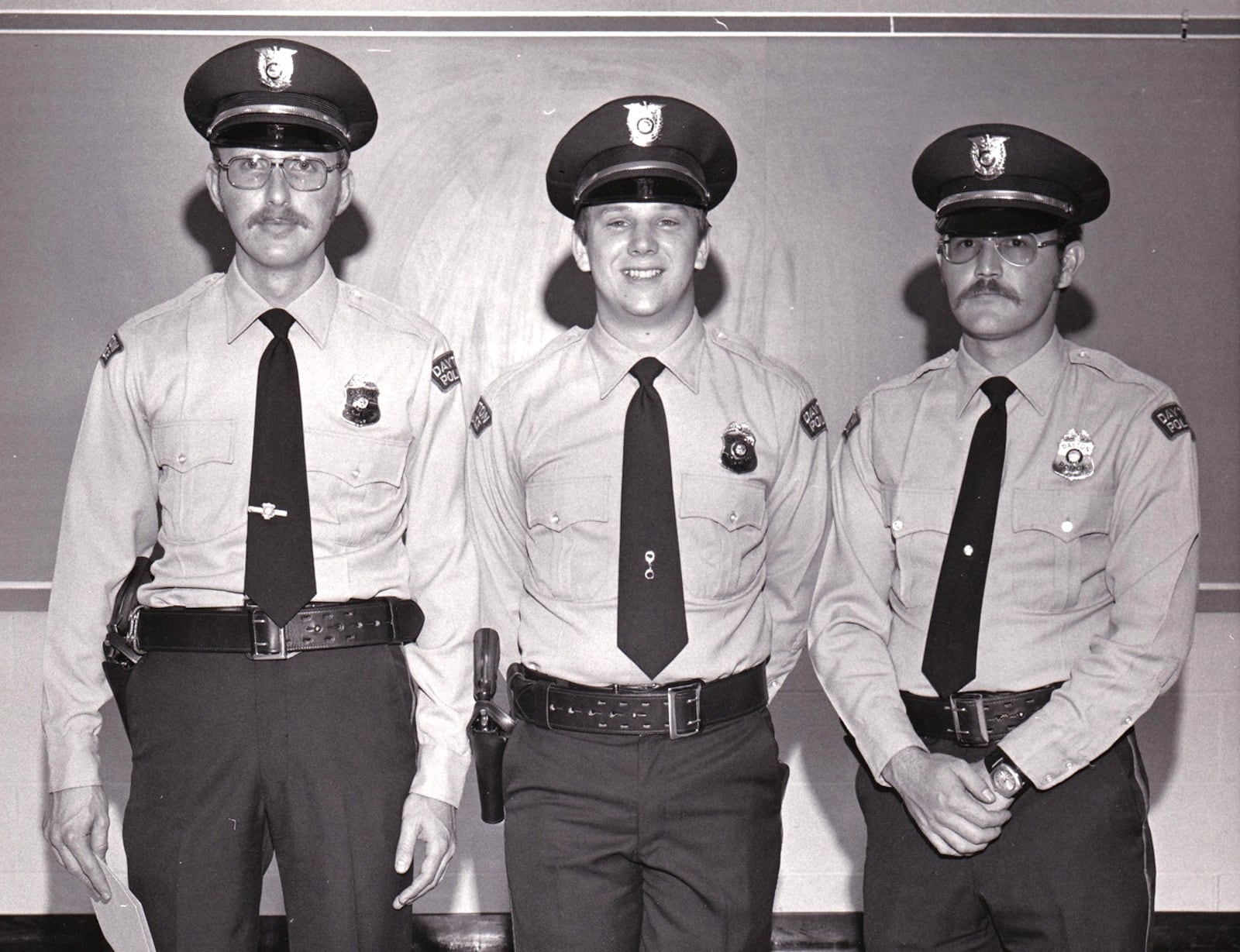 Dayton Police Officer William Steven Whalen photographed in 1976 with police academy classmates Kevin Nichols and Lemyal "L.D." Terrell.  Officer Whalen was killed in the line of duty in 1991.  DAYTON POLICE HISTORY FOUNDATION