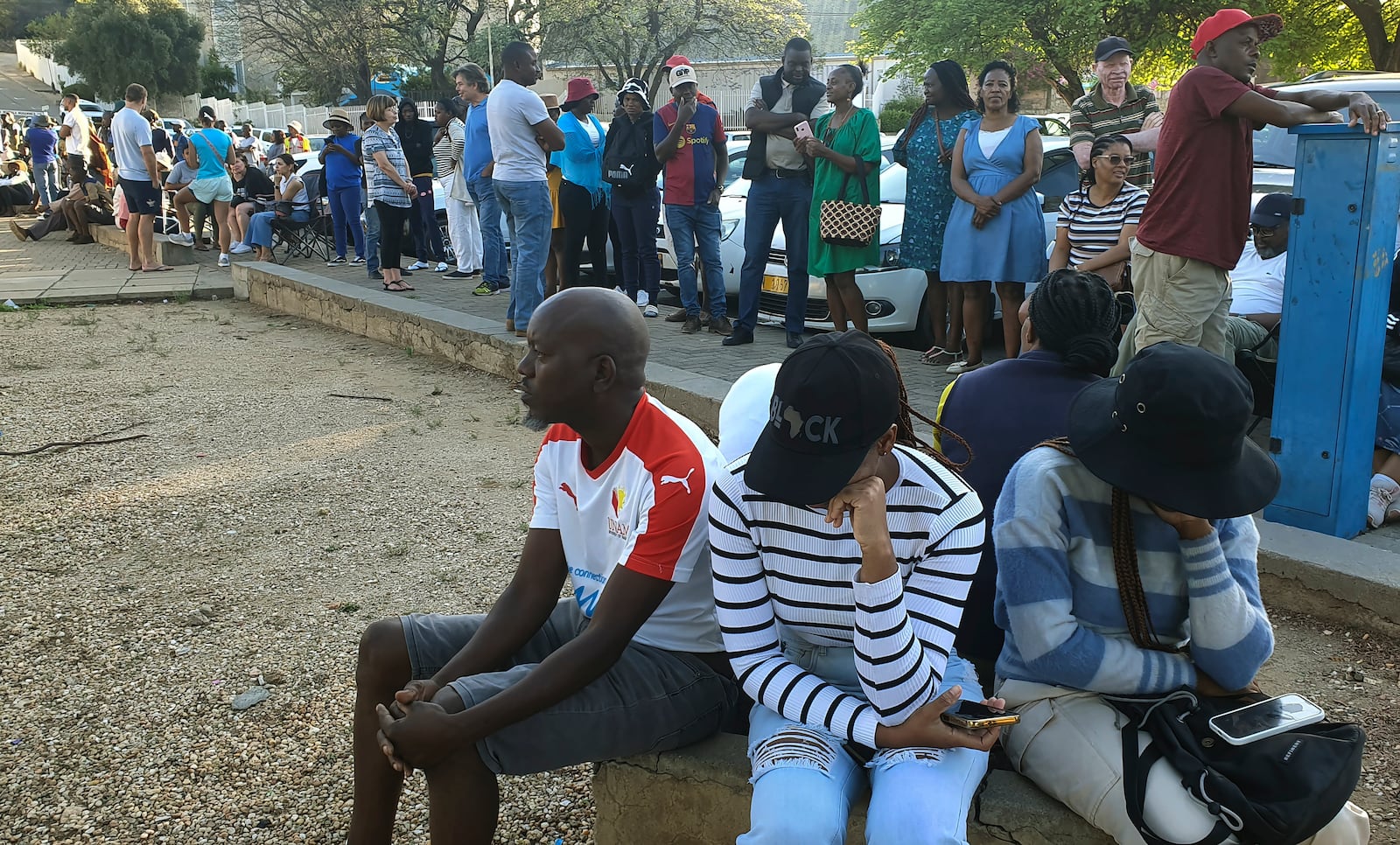 Namibians queue to cast their votes in a presidential election in Windhoek, Namibia Wednesday, Nov. 27, 2024. (AP Photo/Dirk Heinrich)