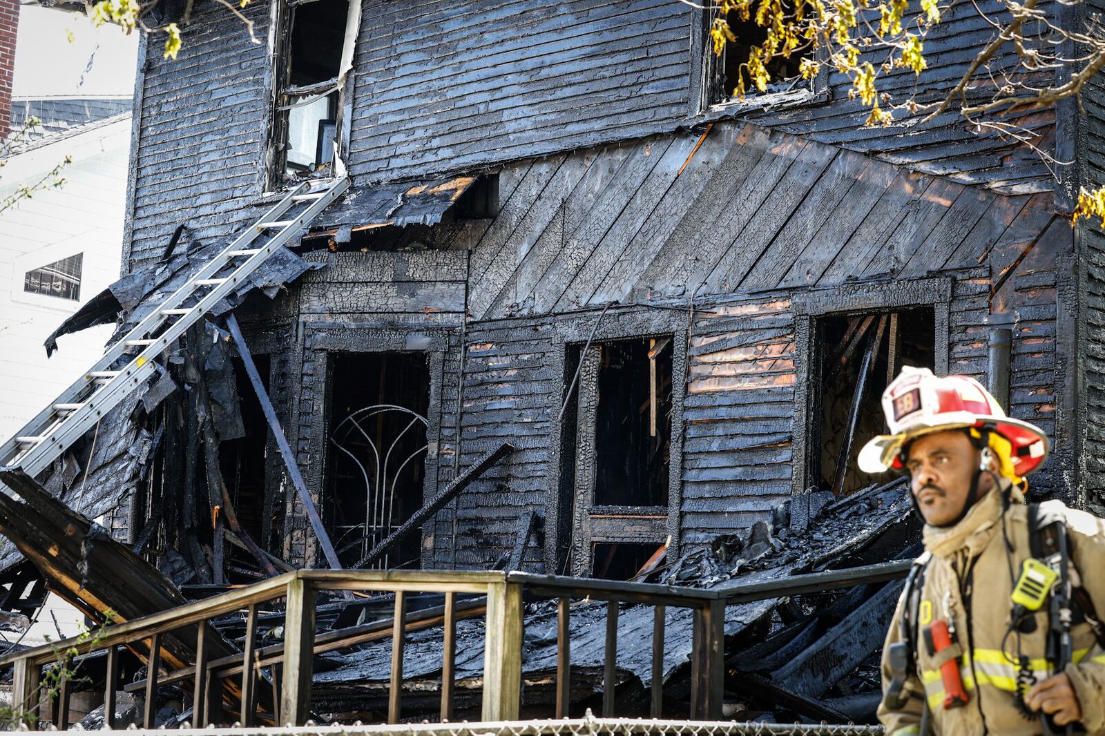 The front porch roof collapsed during a heavy fire that killed a resident Monday, May 9, 2022, on Seminary Avenue in Dayton. JIM NOELKER/STAFF